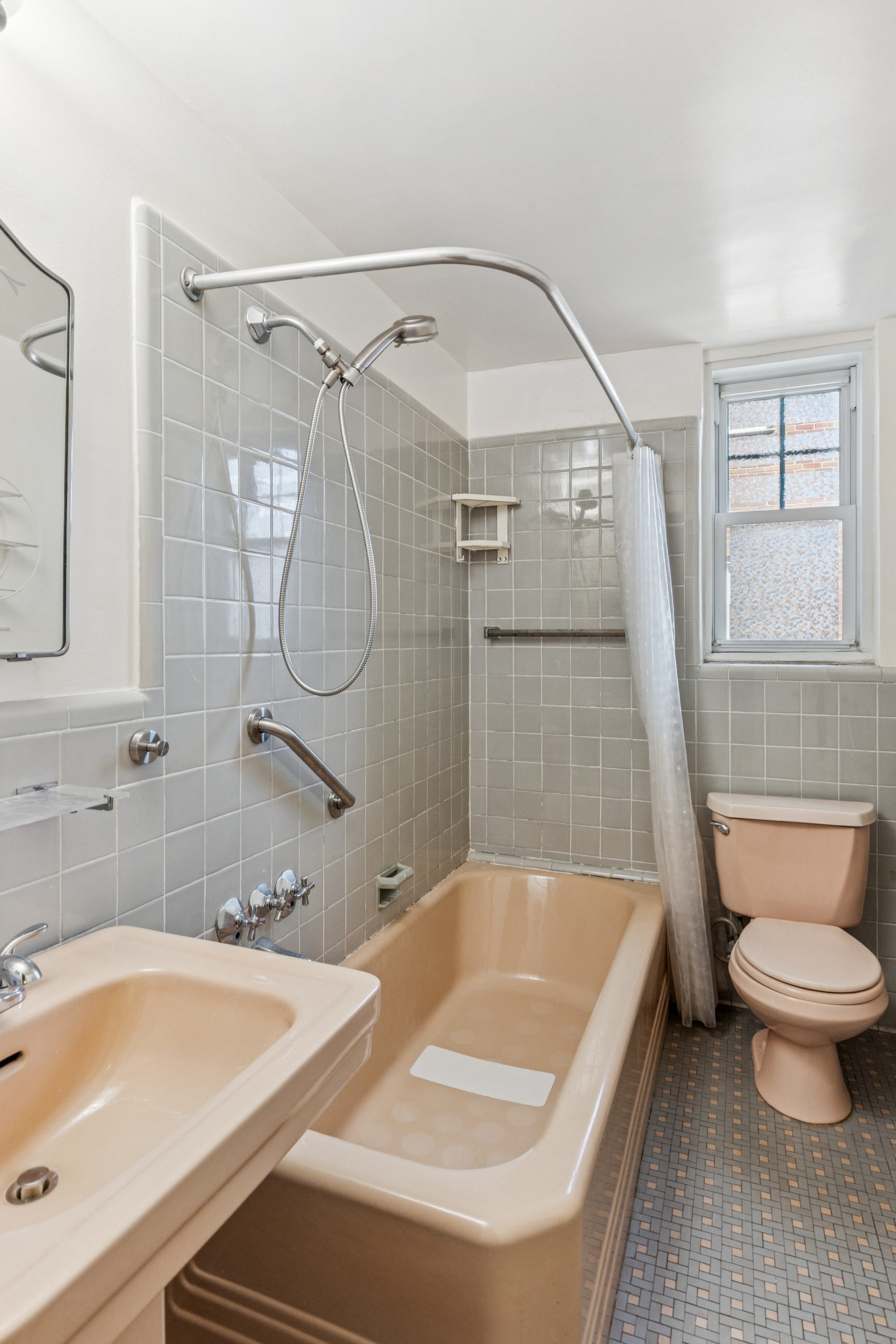 200 Cabrini Boulevard, Unit 47 Manhattan, NY 10033 - Photo 7 of 20 a bathroom with a sink and a toilet