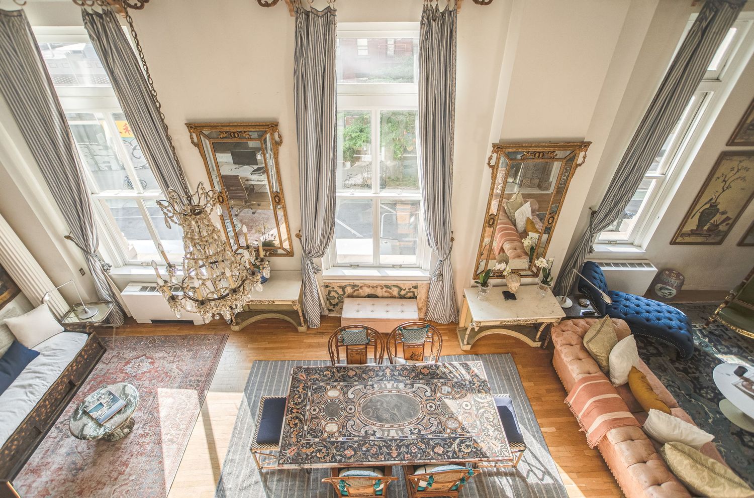 240 Centre Street, Unit 3B Manhattan, NY 10013 - Photo 6 of 23 a living room with furniture and a large window