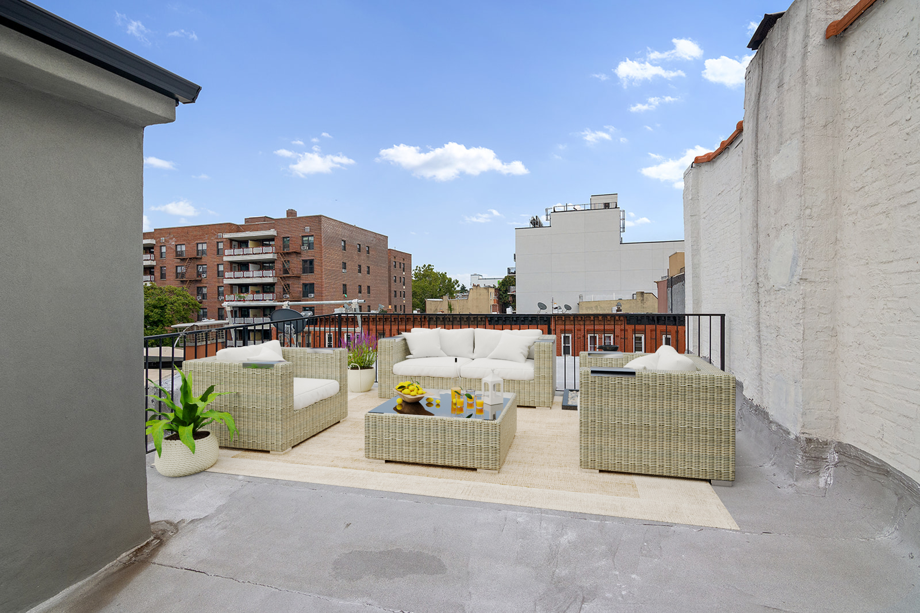 371 Herkimer Street Brooklyn, NY 11213 - Photo 14 of 16 a view of a terrace with couches and potted plants