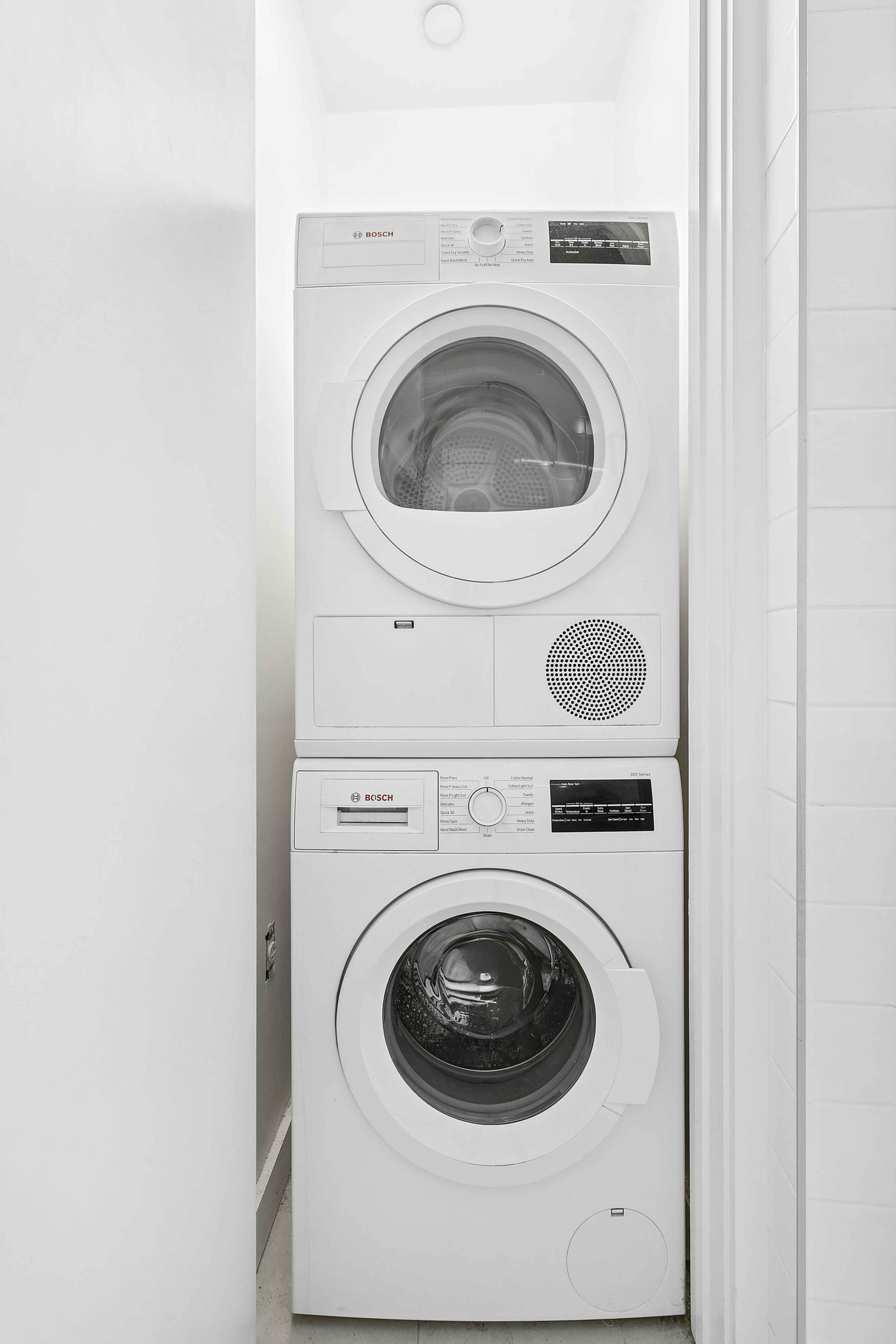 51 East 131st Street, Unit 6A Manhattan, NY 10037 - Photo 6 of 9 a utility room with dryer and washer