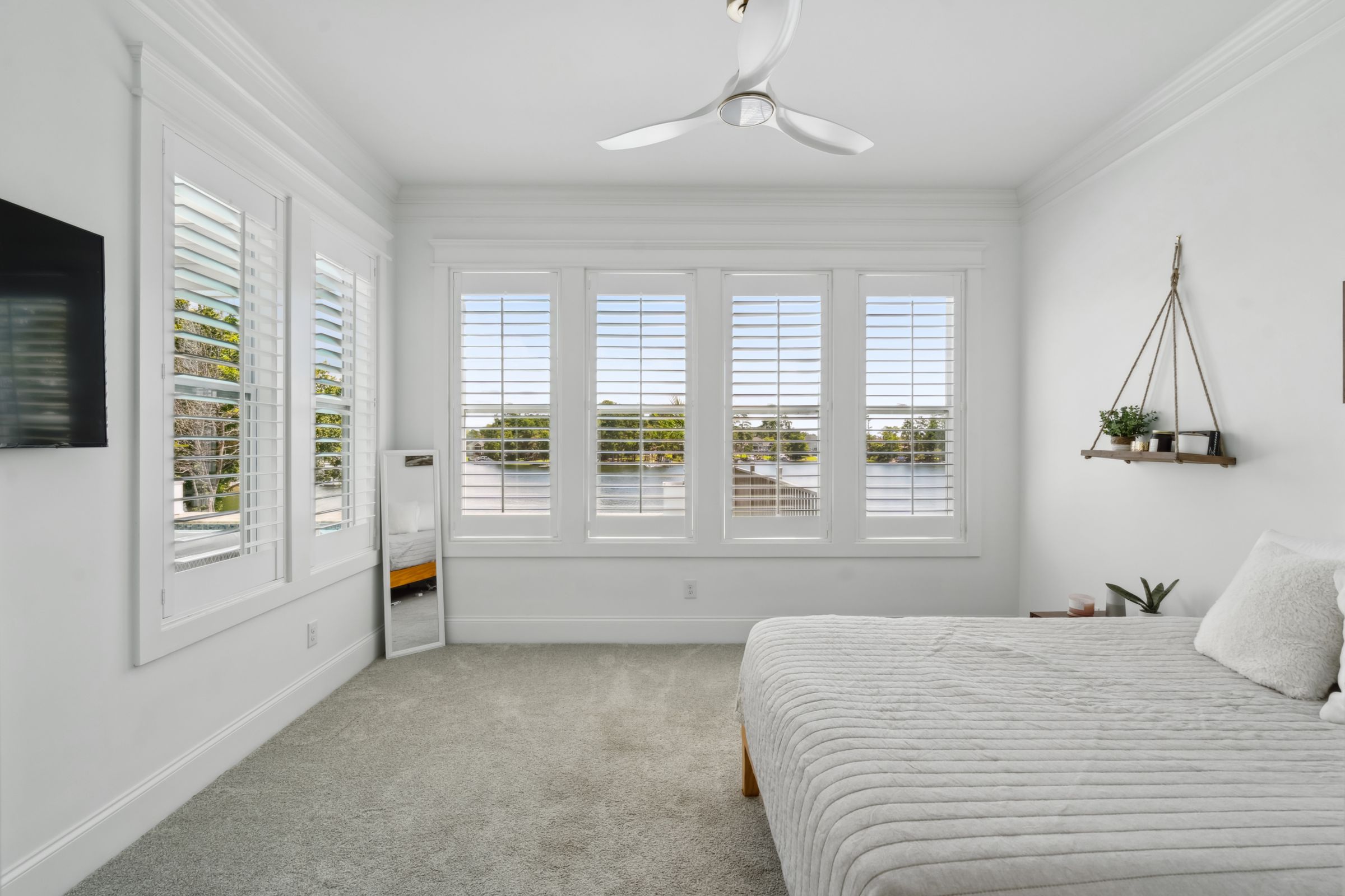 249 Pointe Overlook Drive Chapin, SC 29036 - Photo 40 of 56 a bedroom with a large bed and a window