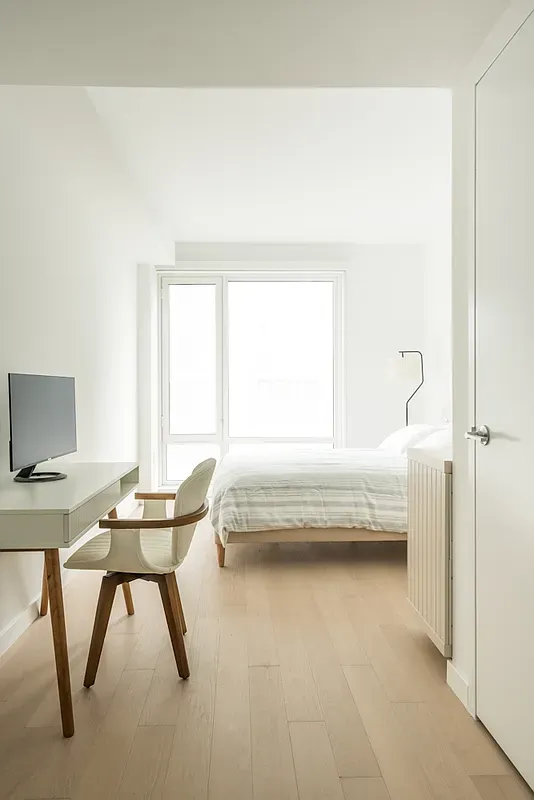 a bathroom with a bathtub and a sink