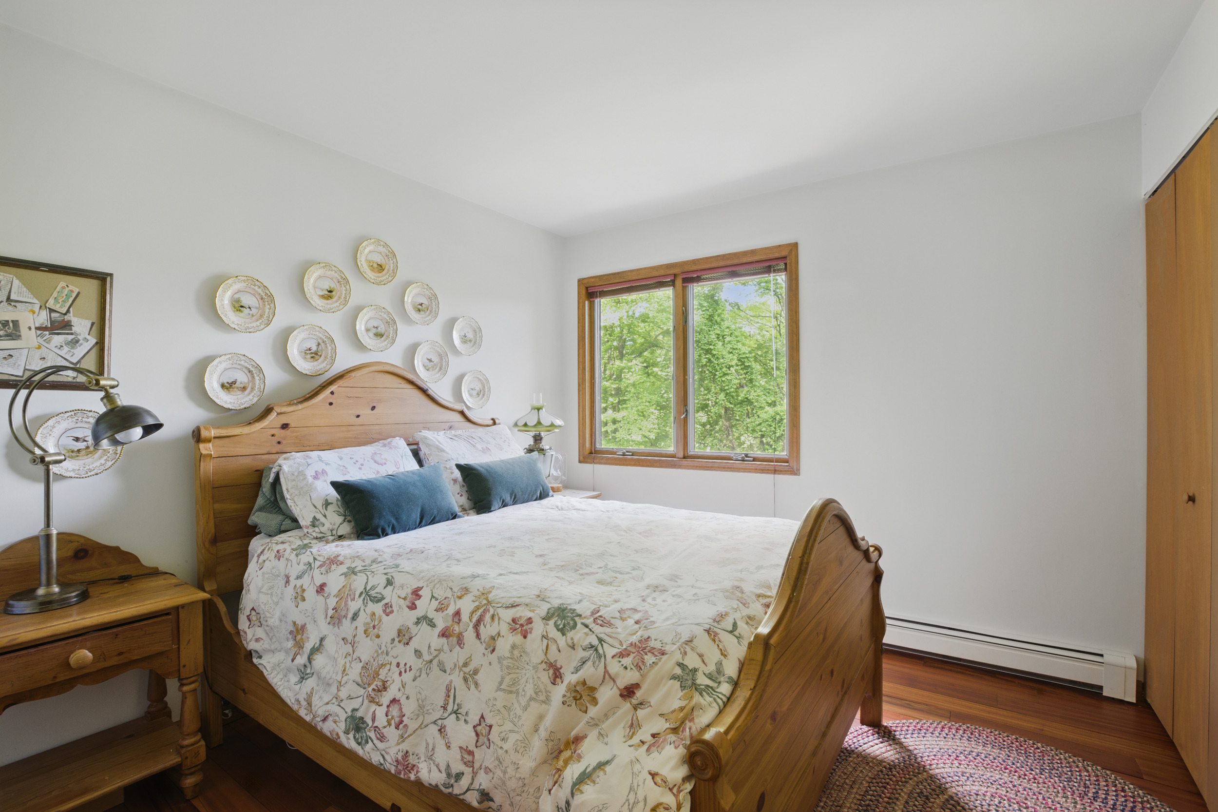 19 Pond Road Cold Spring, NY 10516 - Photo 19 of 32 a bedroom with a bed and a window