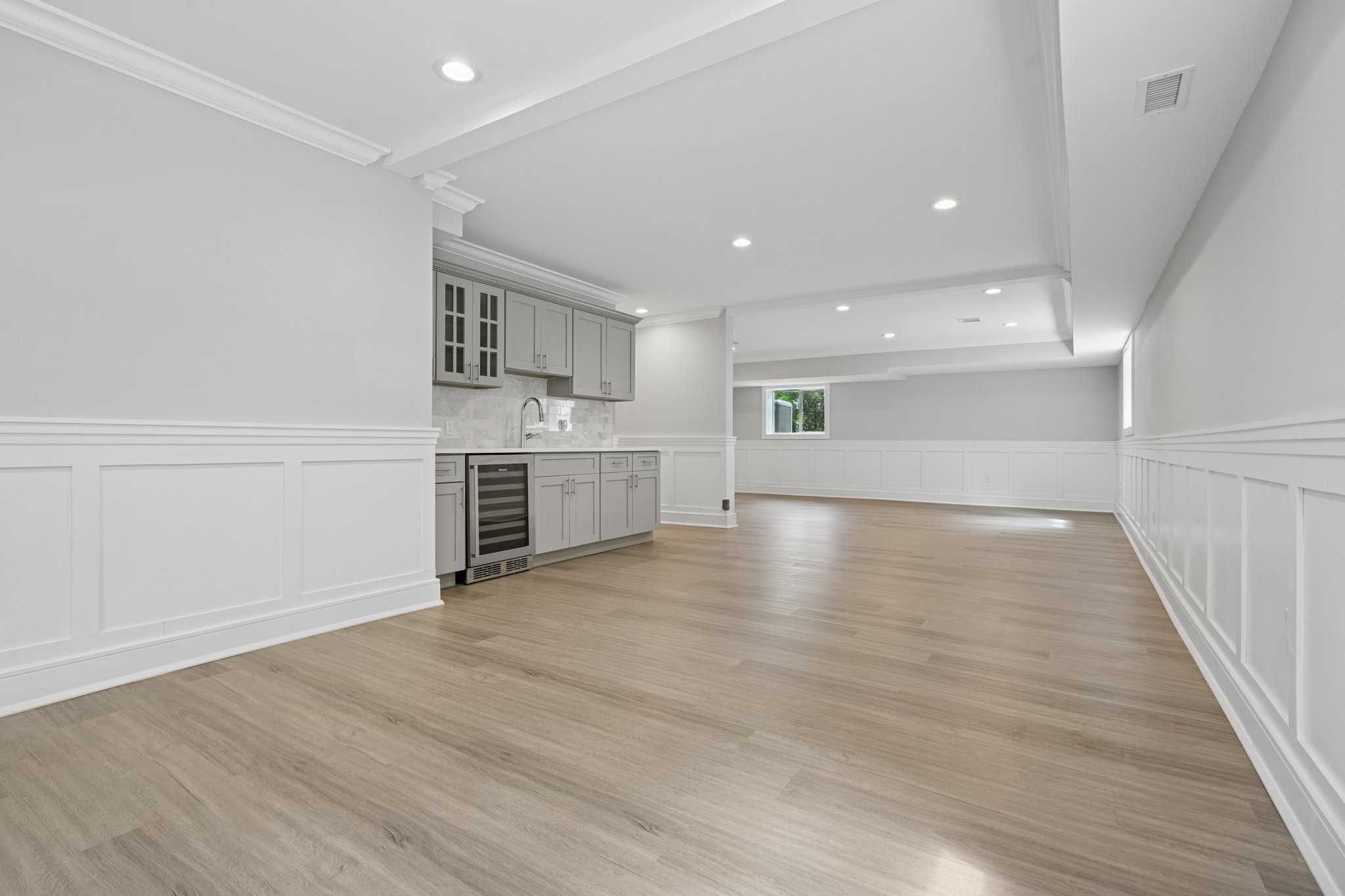 823 River Road Chatham, NJ 07928 - Photo 43 of 60 a view of a kitchen with a sink and a stove top oven