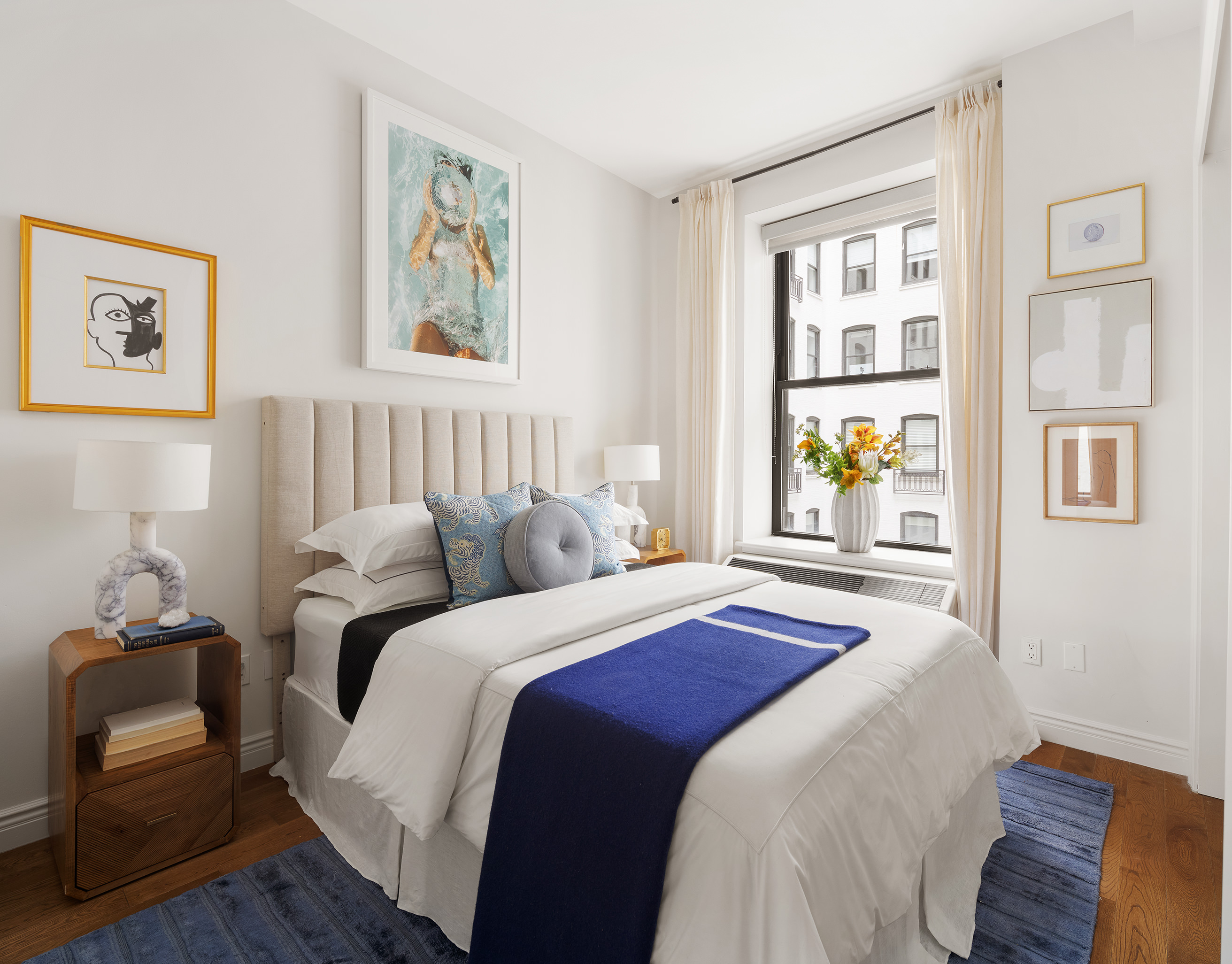 225 5th Avenue, Unit 6T Manhattan, NY 10010 - Photo 6 of 12 a bedroom with a bed and a window