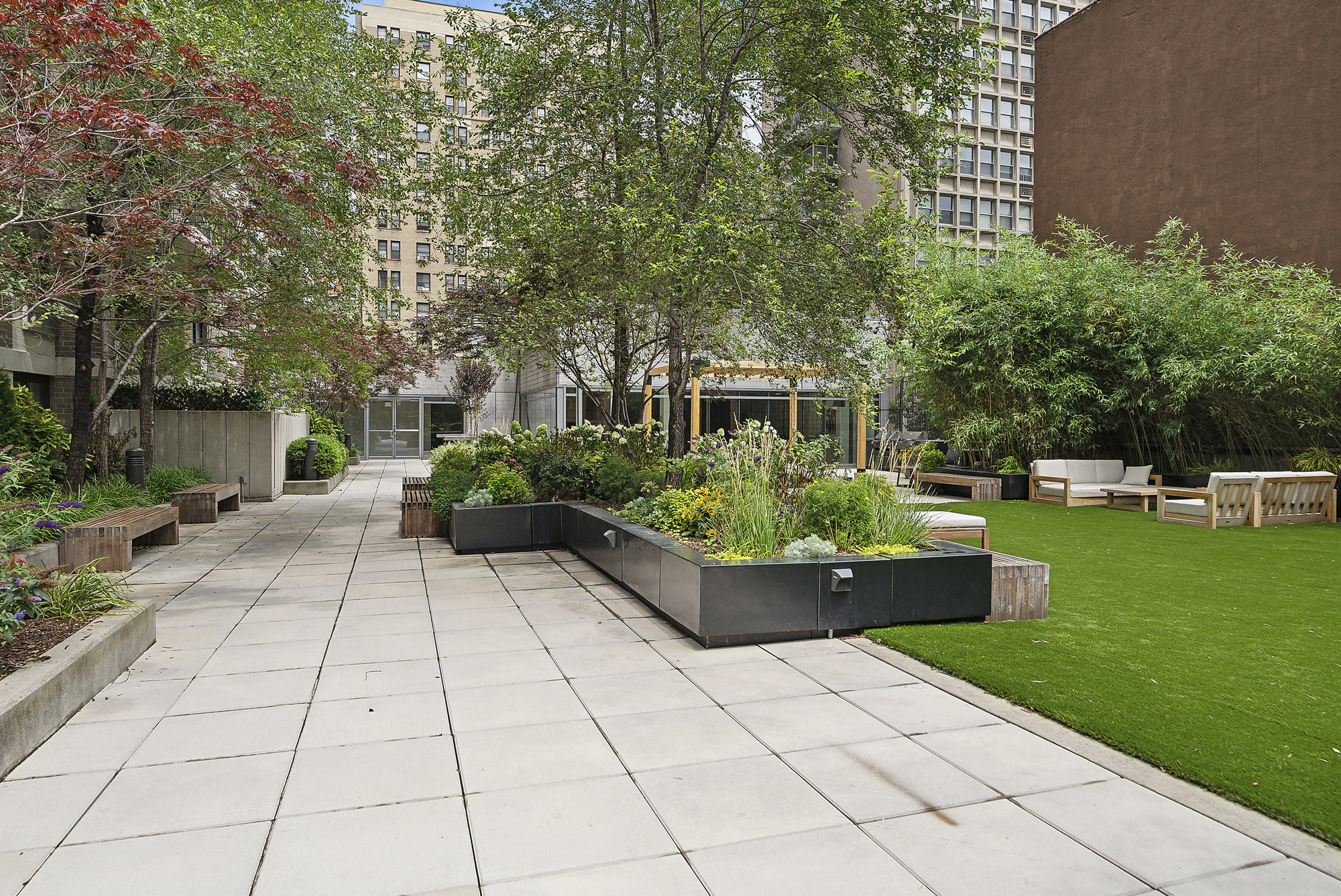 175 West 95th Street, Unit 18G Manhattan, NY 10025 - Photo 10 of 14 a view of a patio with couches and potted plants