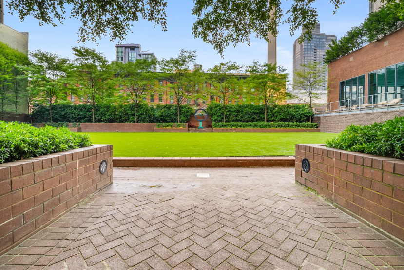515 East 72nd Street, Unit 40E Manhattan, NY 10021 - Photo 27 of 34 a view of outdoor space with garden and trees