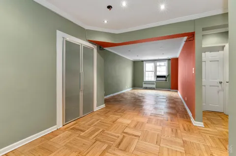 a view of livingroom with kitchen