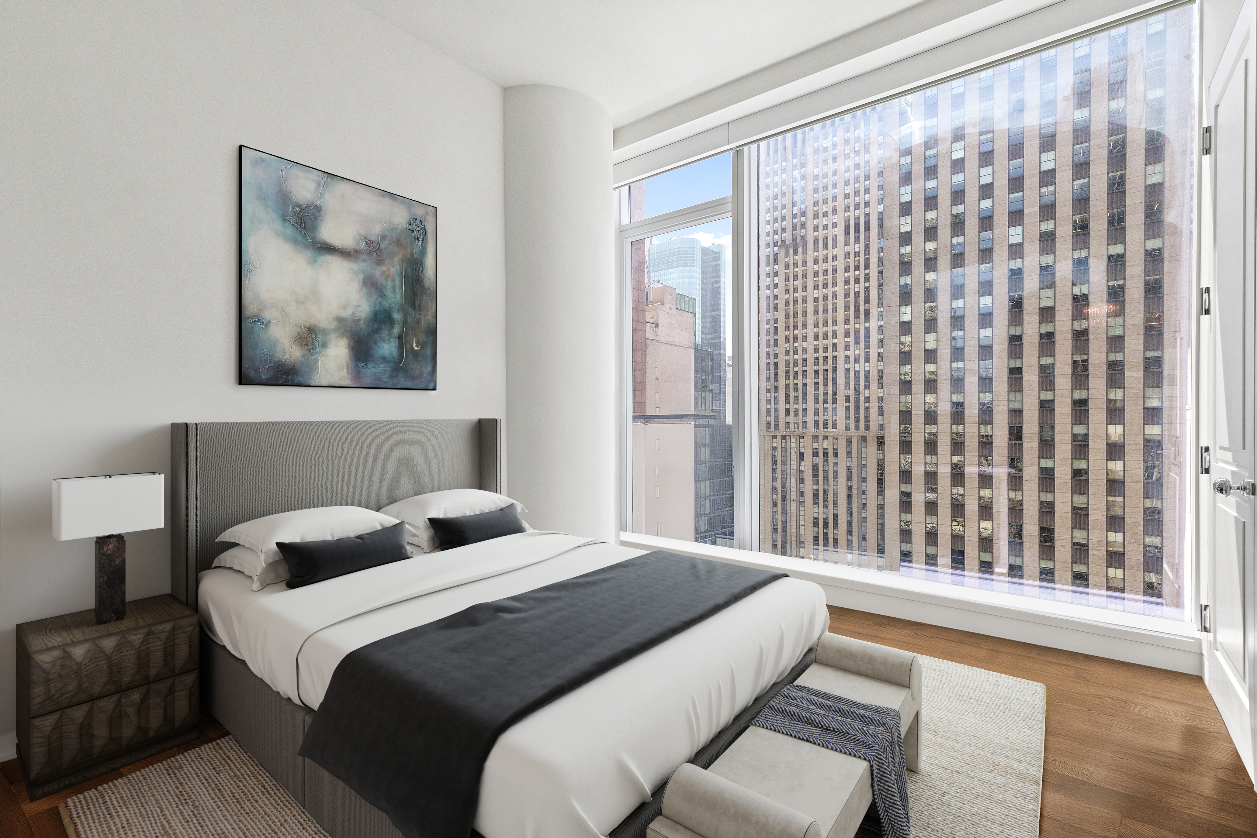 20 West 53rd Street, Unit 22A Manhattan, NY 10019 - Photo 9 of 16 a bedroom with a bed and a painting on the wall