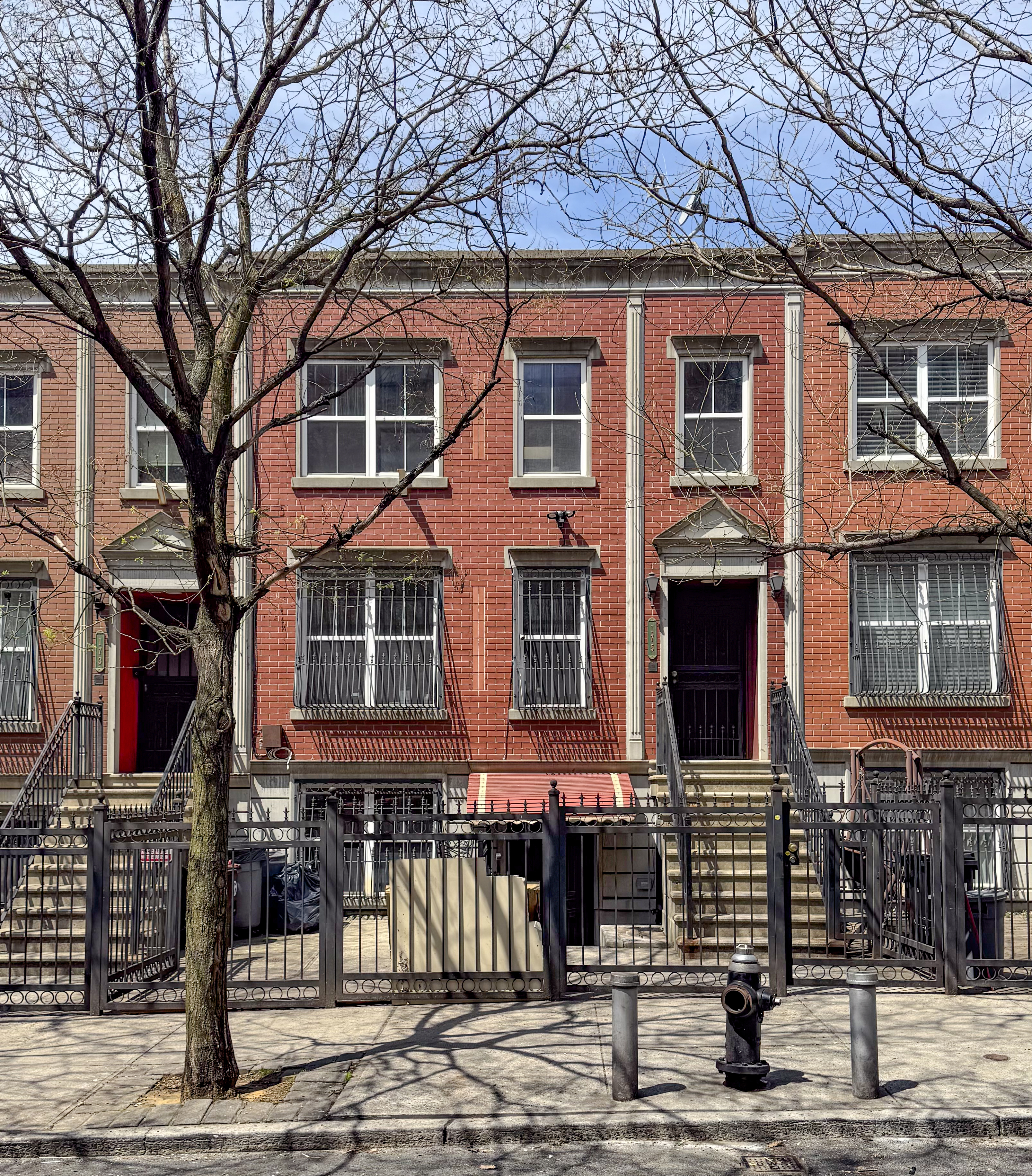 a front view of a house with street