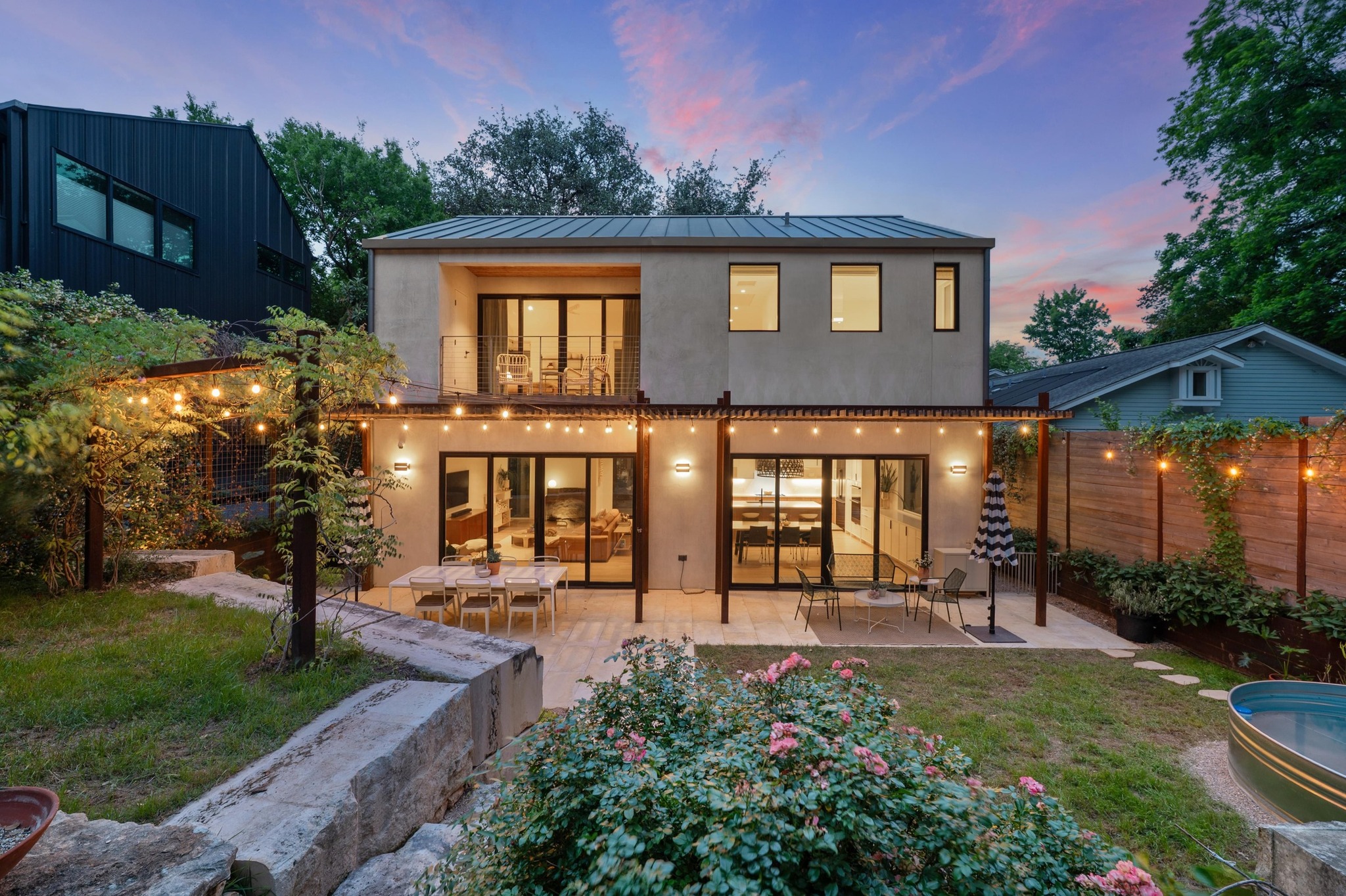 1206 Bickler Road Austin, TX 78704 - Photo 54 of 65 a view of a building with a garden