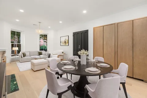 a view of a dining room with furniture