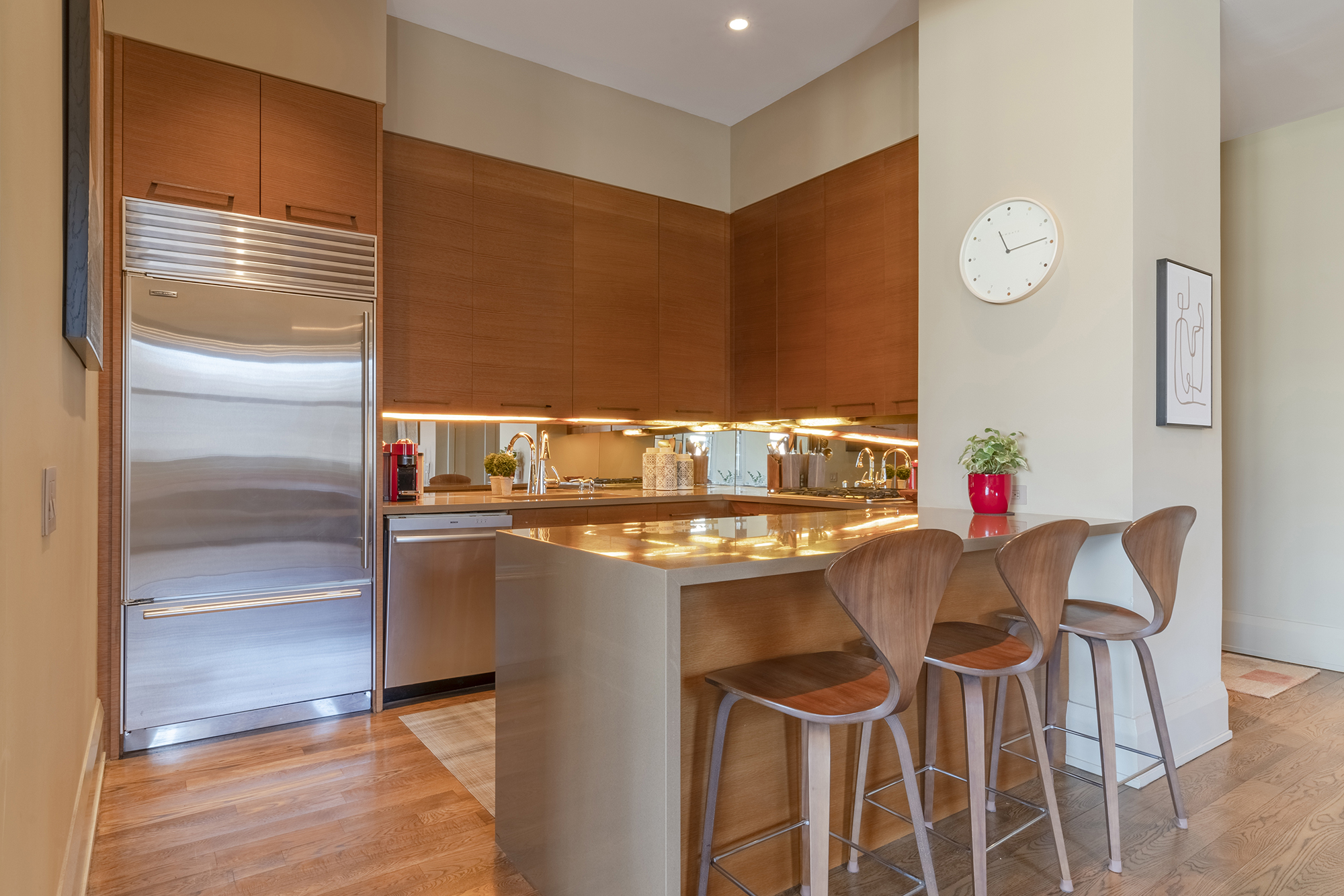 263 9th Avenue, Unit 3E Manhattan, NY 10001 - Photo 13 of 17 a kitchen with a sink cabinets and appliances