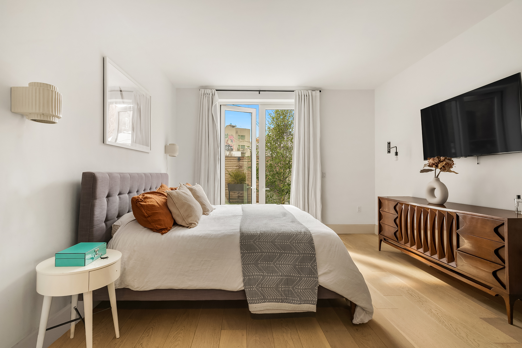 308 North 7th Street, Unit 2F Brooklyn, NY 11211 - Photo 5 of 17 a bedroom with a bed and a window