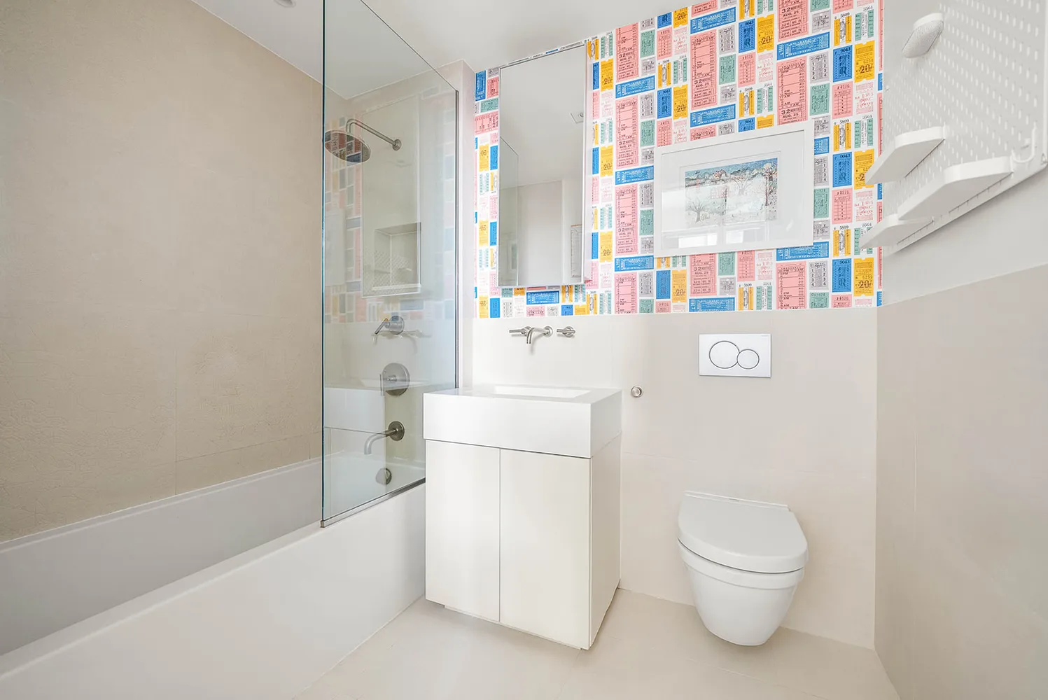 a white bath tub sitting next to a white toilet