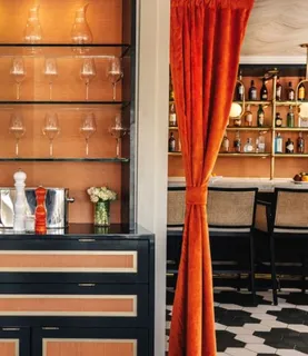 a view of a dining hall with many windows