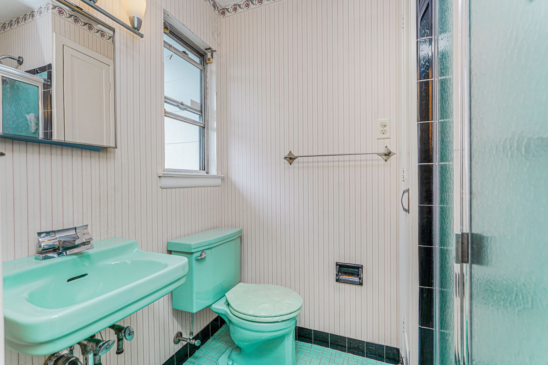 461 Mayfair Drive South Brooklyn, NY 11234 - Photo 19 of 30 a bathroom with a toilet sink and mirror