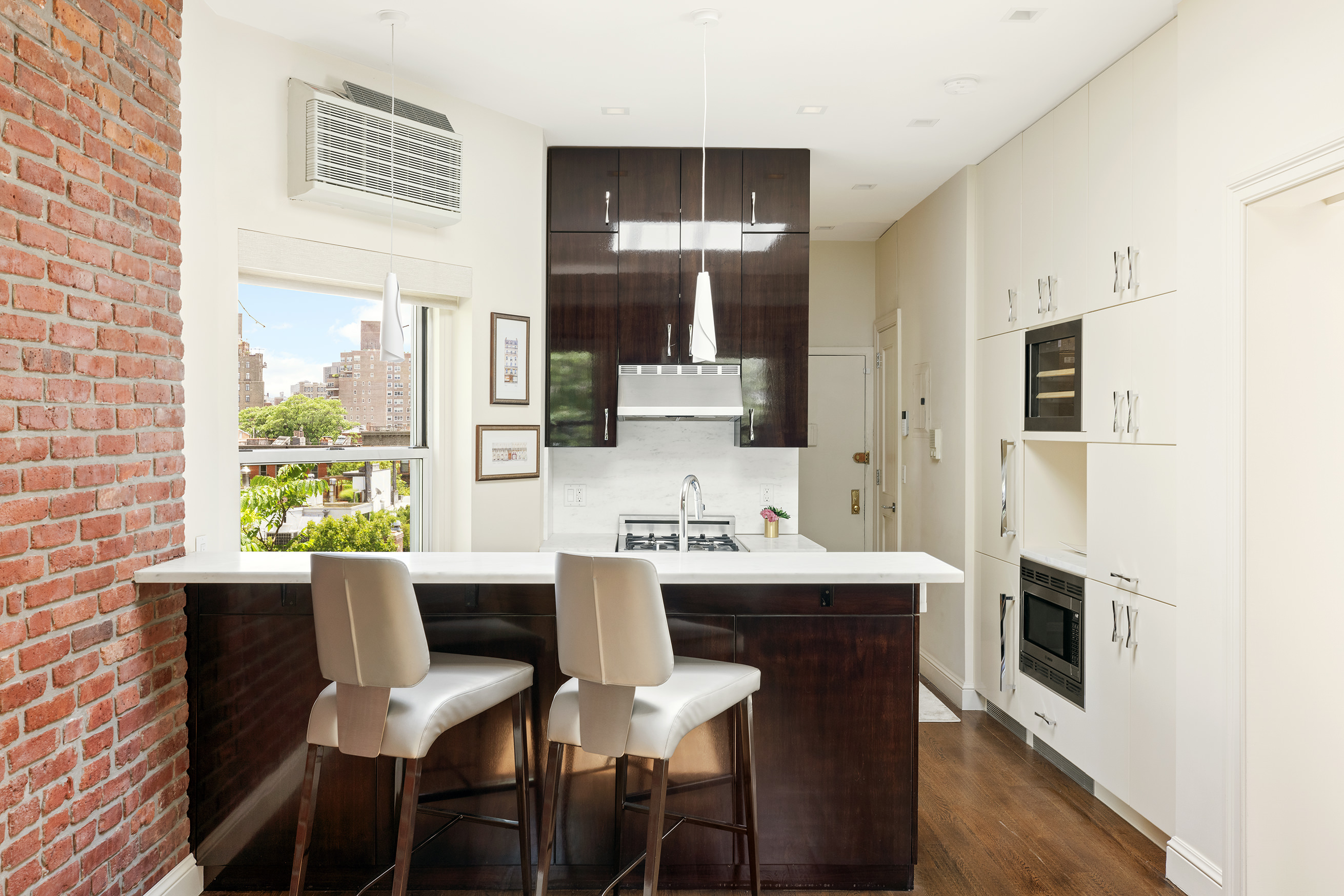 77 Perry Street, Unit 6CD Manhattan, NY 10014 - Photo 6 of 16 a view of a dining room with furniture and window