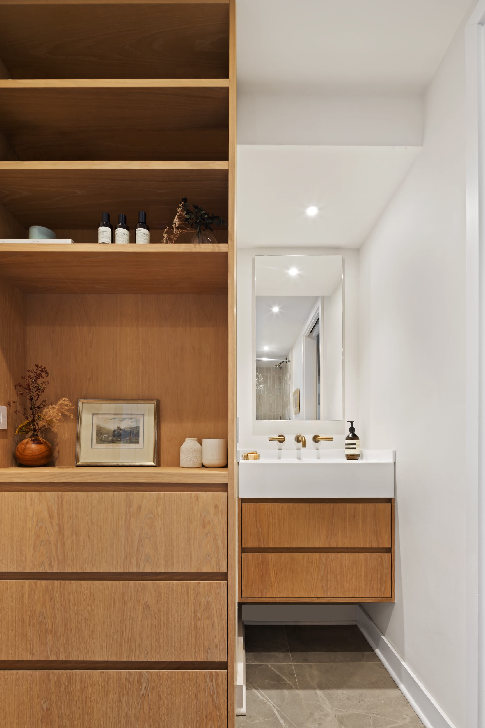 2 Horatio Street, Unit 4JS Manhattan, NY 10014 - Photo 10 of 20 a bathroom with a sink a mirror and cabinets