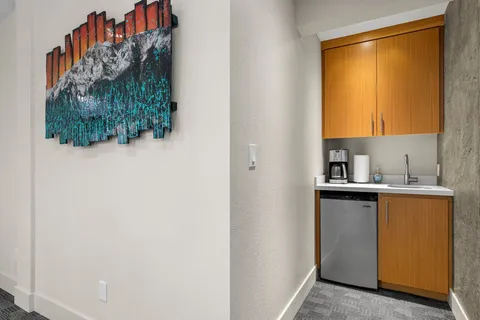 a kitchen with a sink and a window