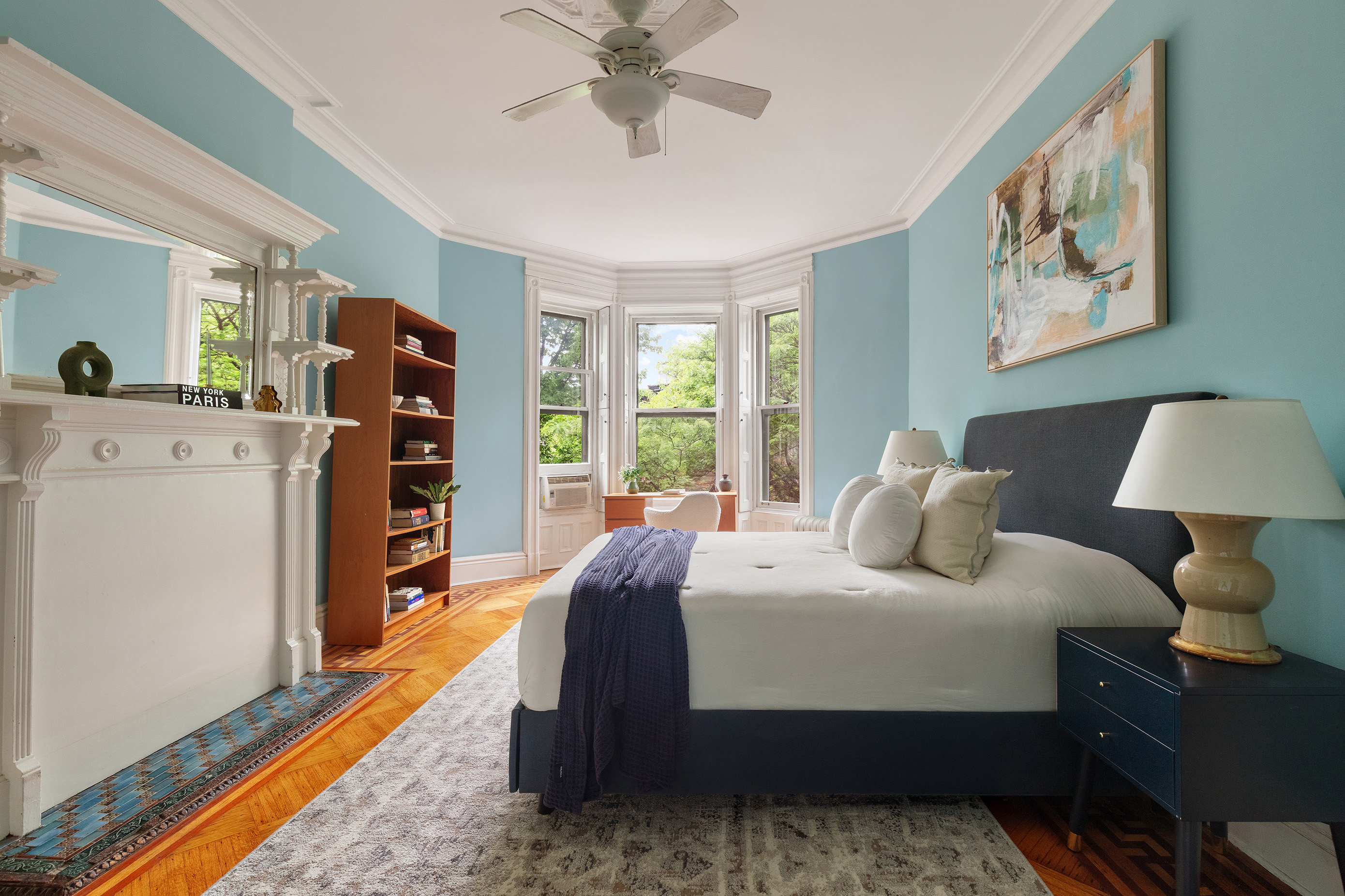 836 President Street Brooklyn, NY 11215 - Photo 15 of 23 a bedroom with a bed and a chandelier