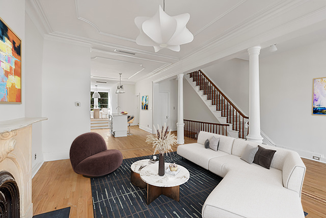 993 Lorimer Street, Unit 2 Brooklyn, NY 11222 - Photo 2 of 15 a living room with furniture a rug and a chandelier