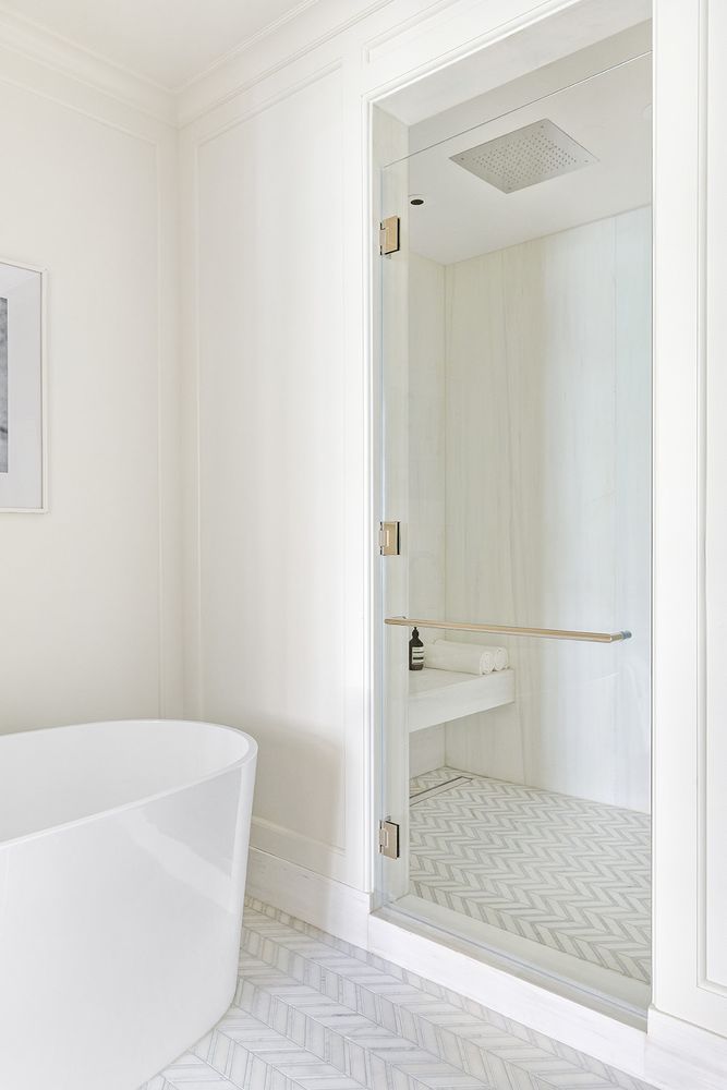 a bathroom with a shower and a toilet