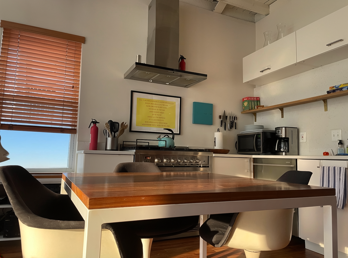 1003 P Street Northwest Washington, DC 20001 - Photo 27 of 34 a kitchen with a table and chairs in it