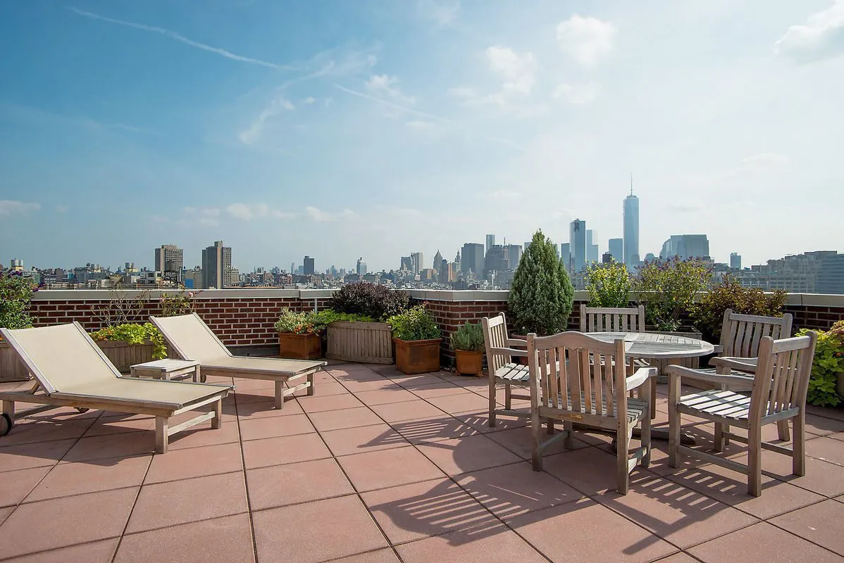 a view of a terrace with sitting area