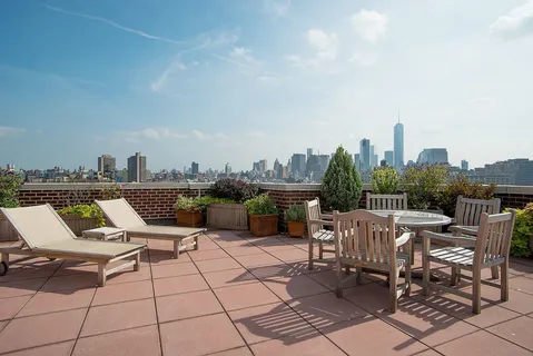a view of a terrace with sitting area