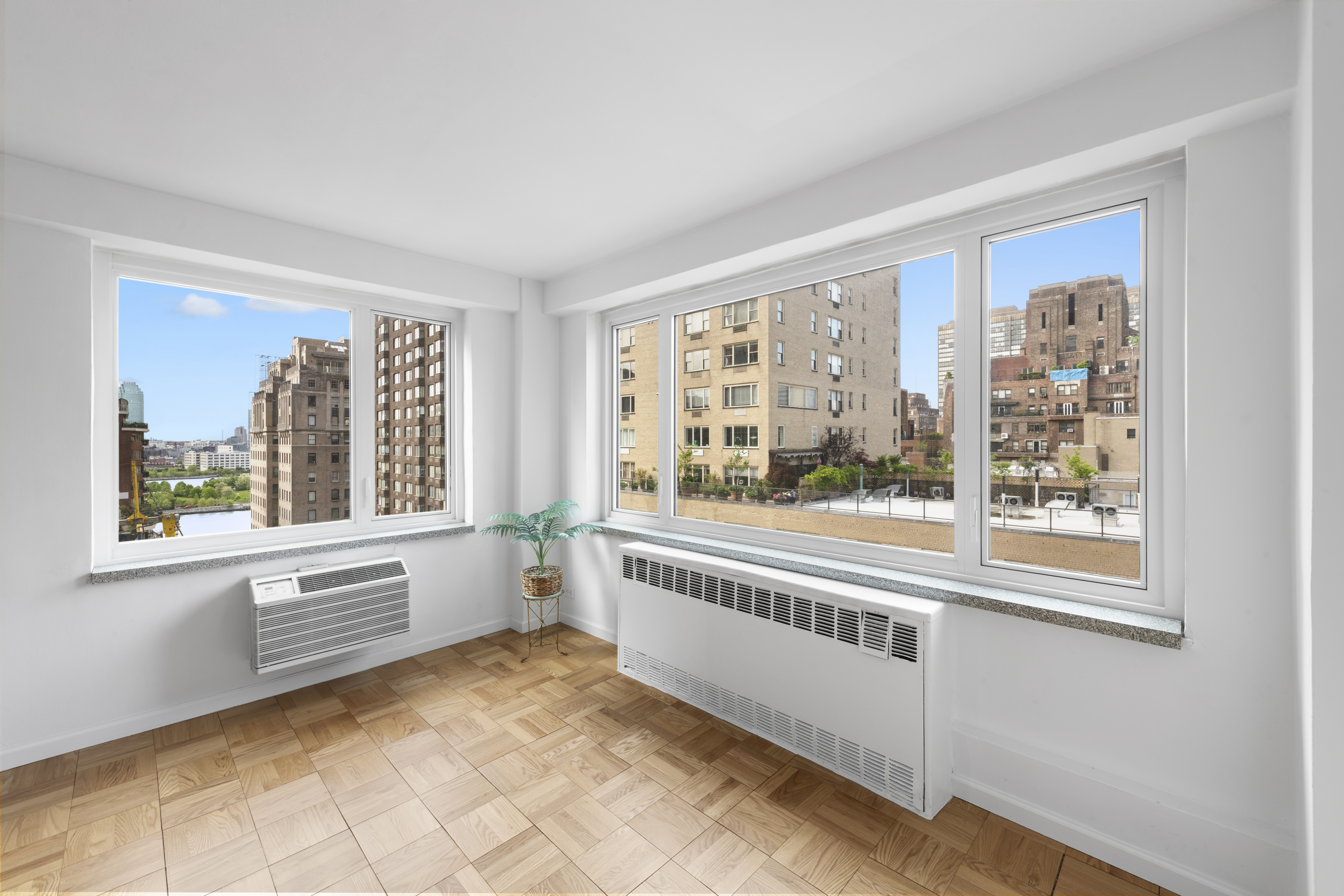 411 East 53rd Street, Unit 16B Manhattan, NY 10022 - Photo 3 of 9 a view of a large window with an outdoor space