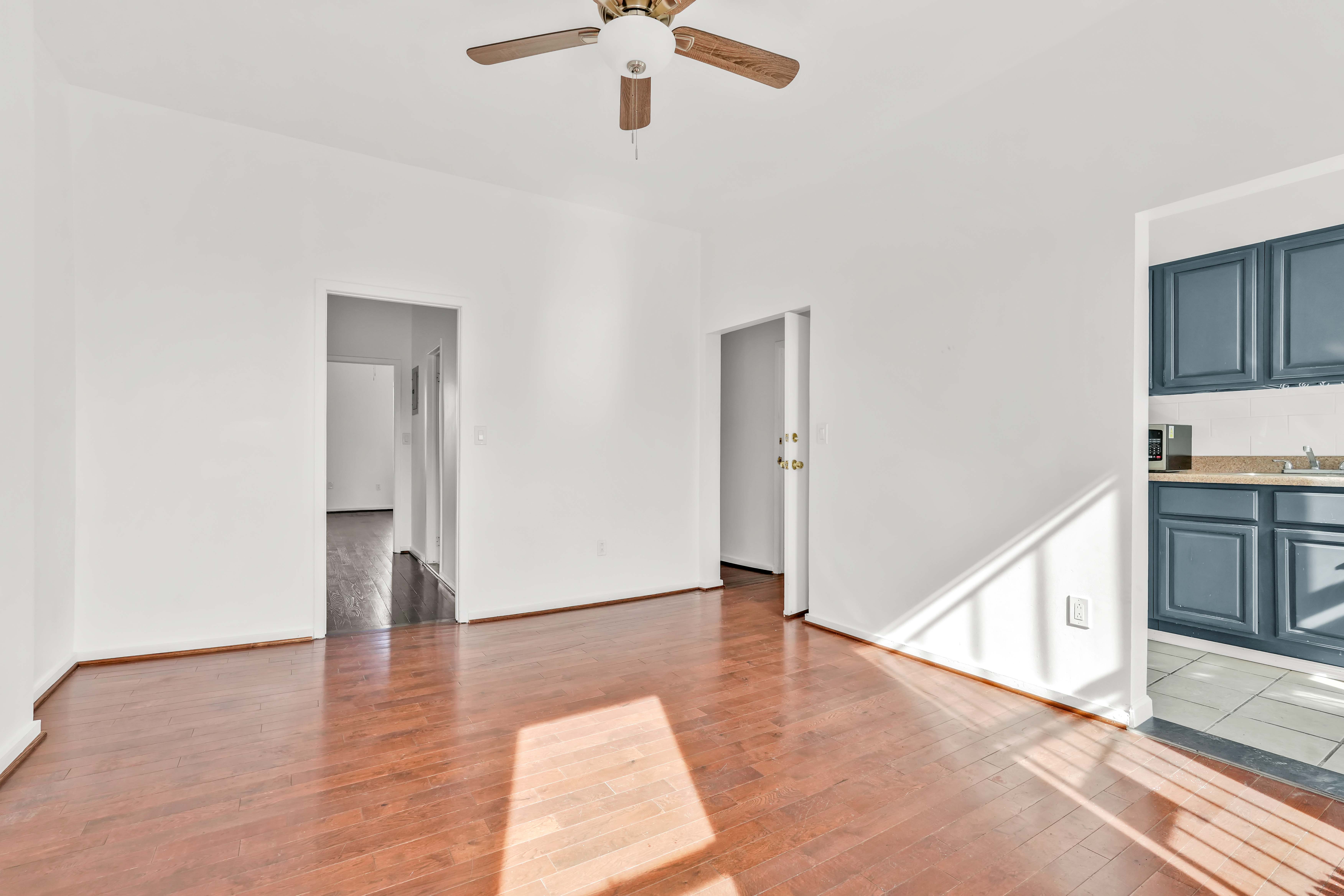 238 Vernon Avenue, Unit 3 Brooklyn, NY 11206 - Photo 9 of 19 a view of an empty room with wooden floor