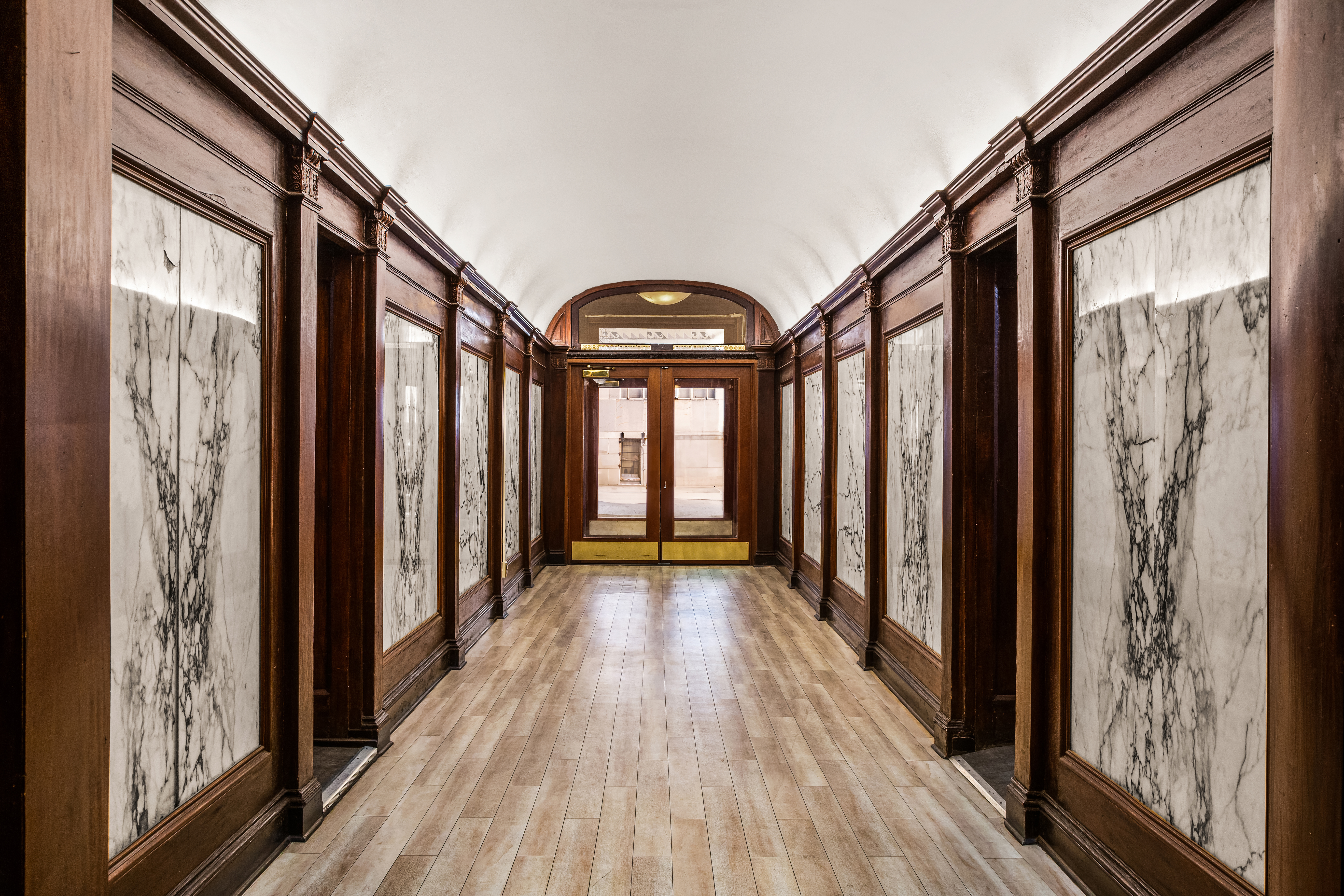 7 West 92nd Street, Unit 76 Manhattan, NY 10025 - Photo 9 of 11 a view of a entryway with wooden floor and door