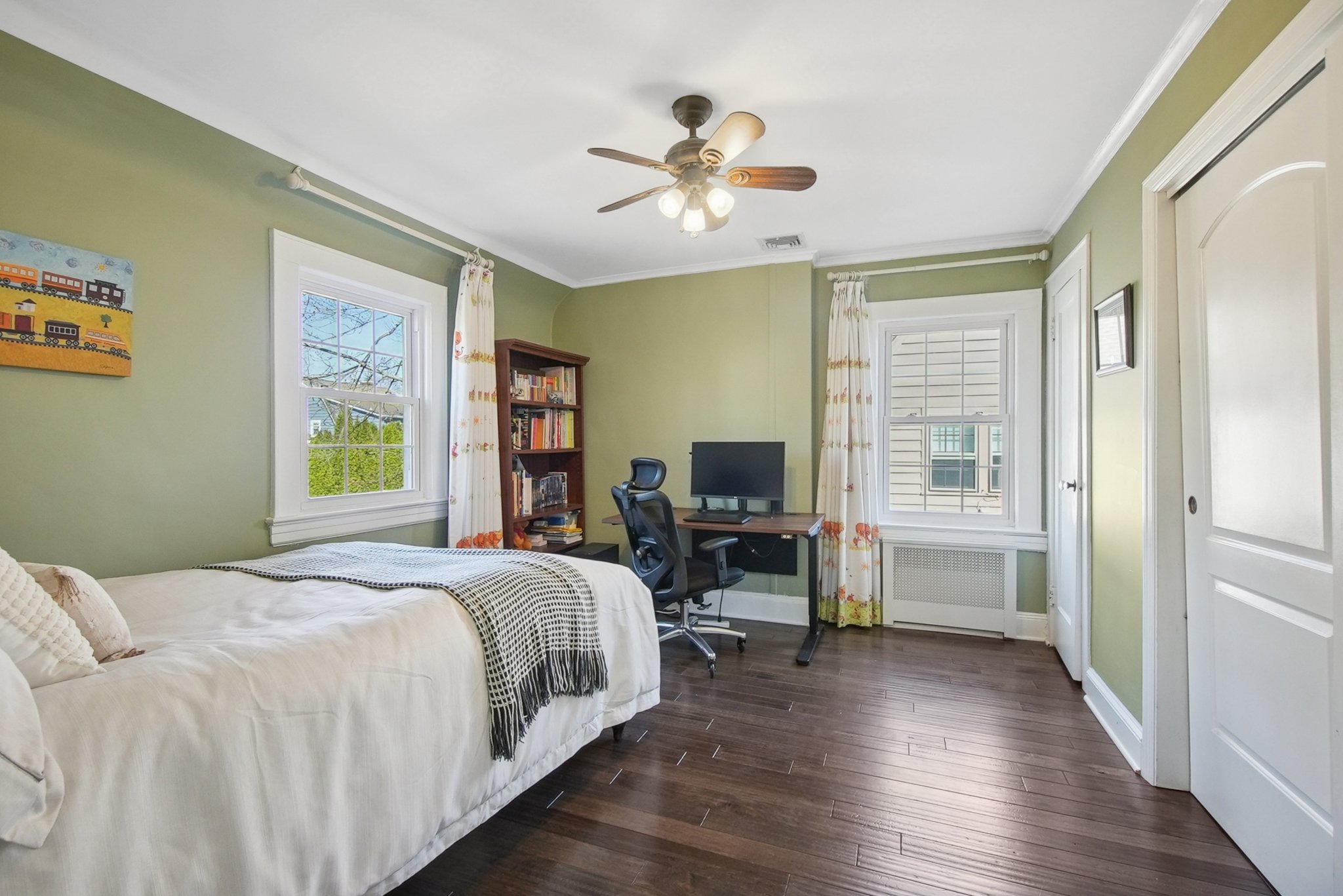 877 Ridgewood Road Millburn, NJ 07041 - Photo 17 of 37 a bedroom with a bed and wooden floor