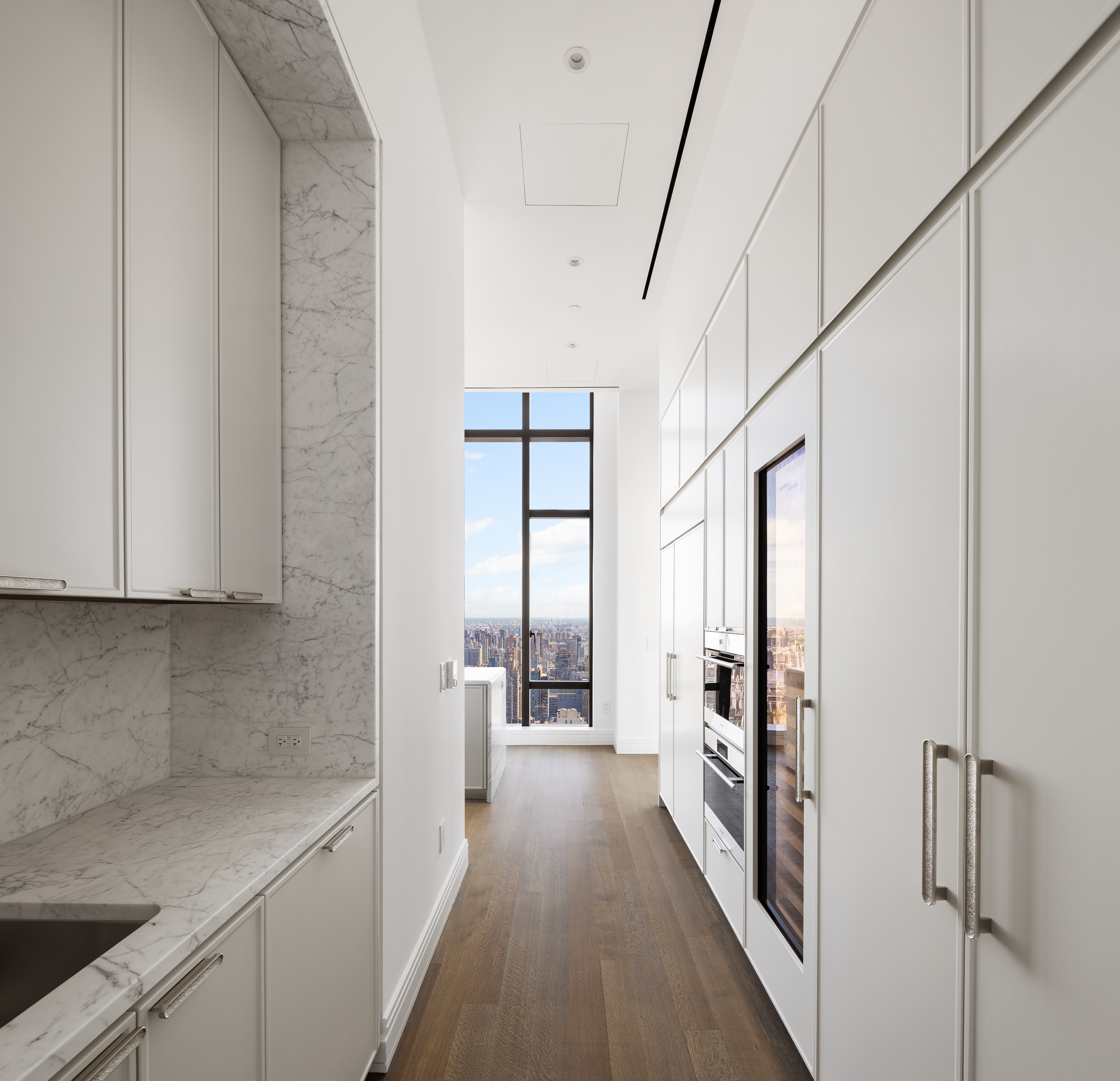 430 East 58th Street, Unit PH71 Manhattan, NY 10022 - Photo 7 of 26 a view of a kitchen with a sink and dishwasher