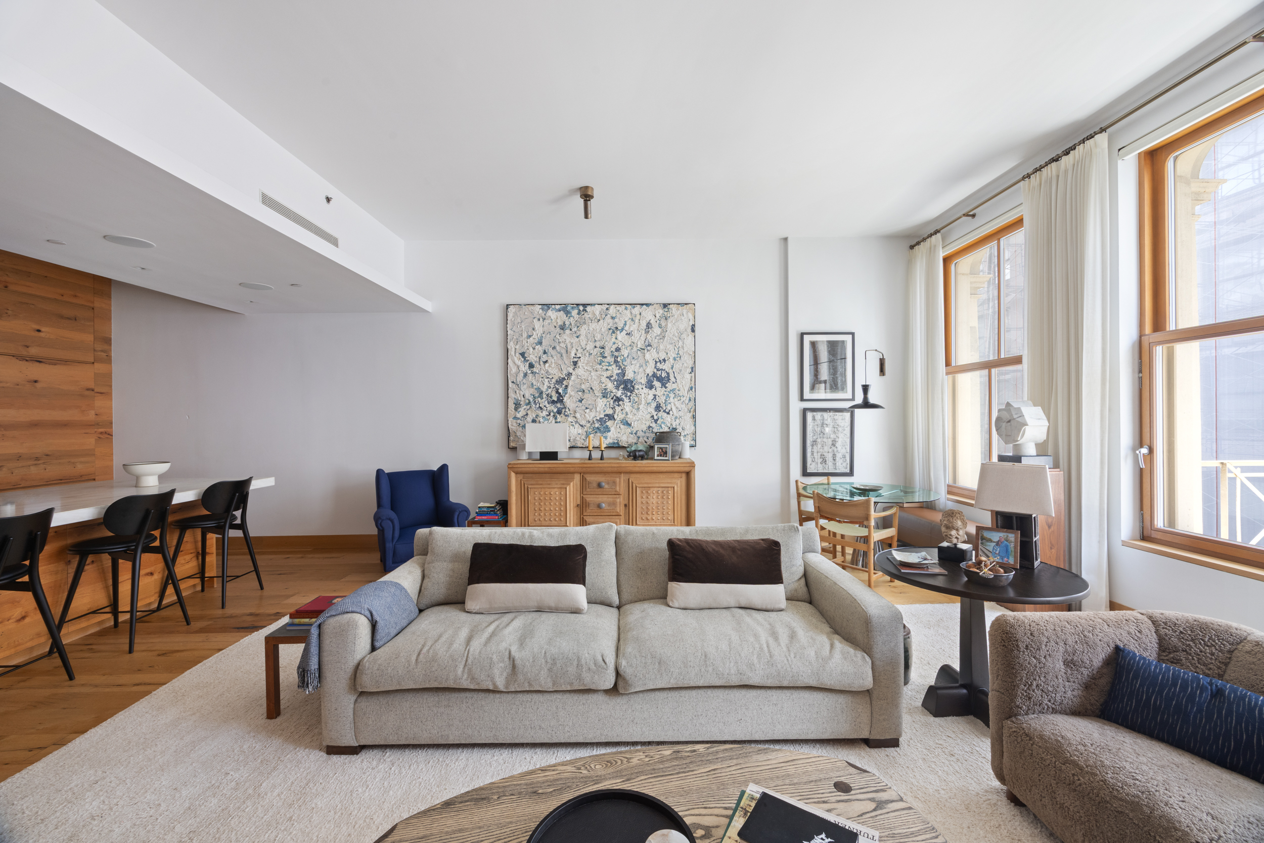 60 White Street, Unit 4E Manhattan, NY 10013 - Photo 4 of 19 a living room with furniture and large windows
