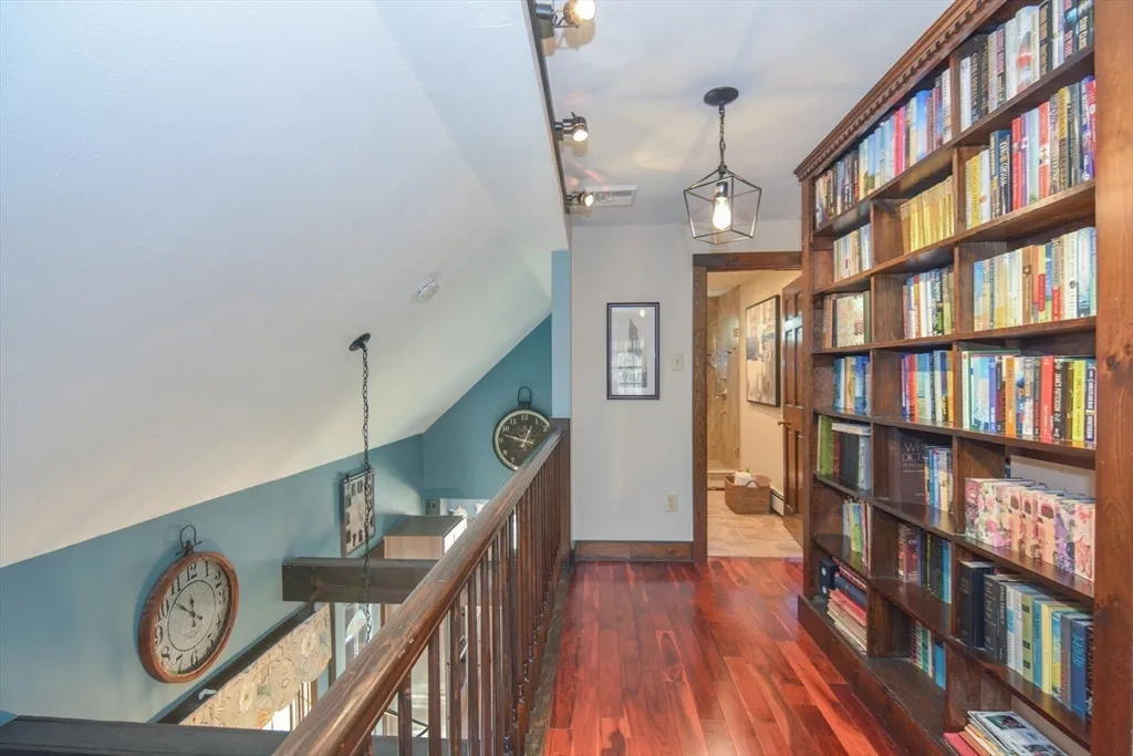 a view of front door with wooden floor