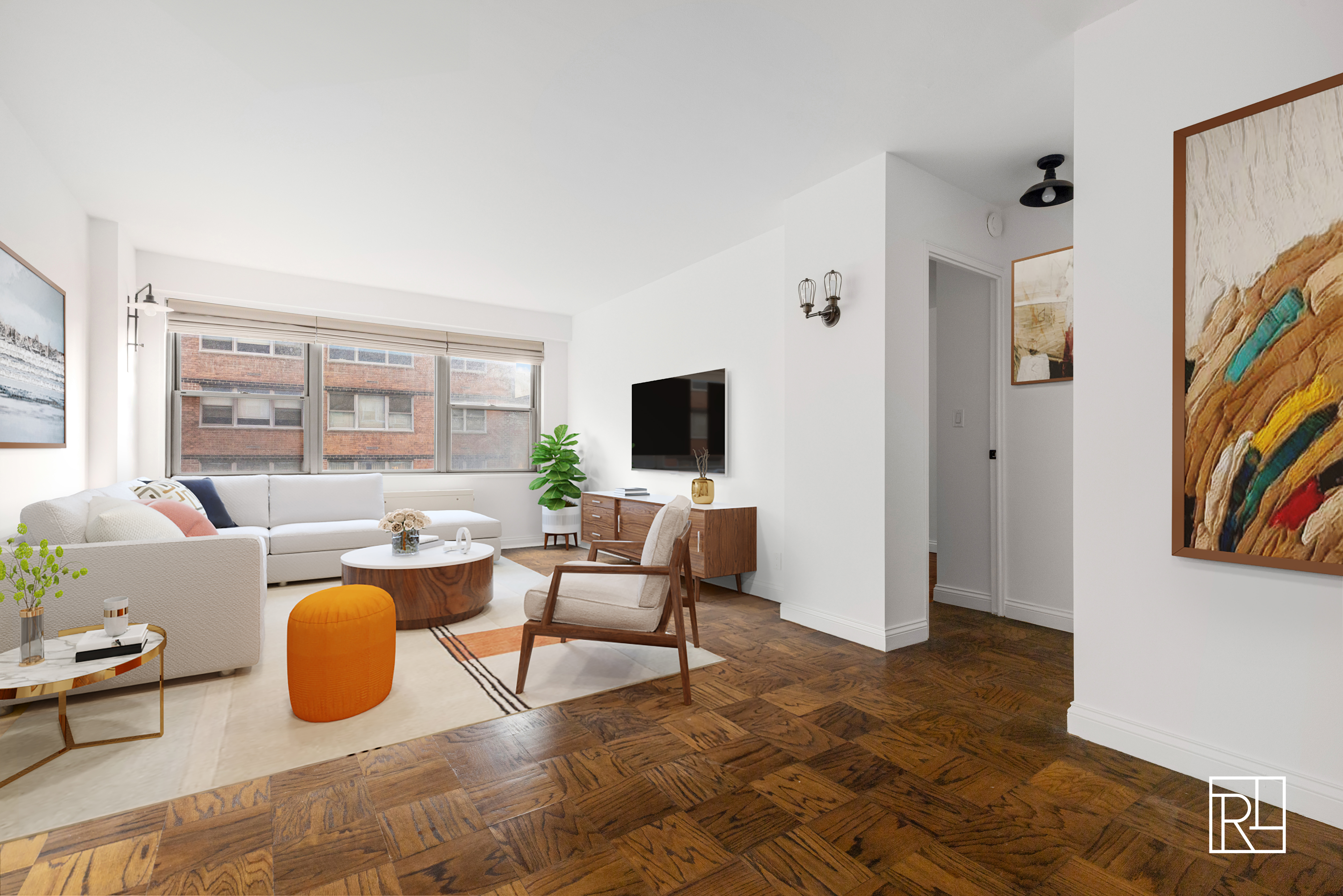10 West 15th Street, Unit 403 Manhattan, NY 10011 - Photo 4 of 12 a living room with furniture and a flat screen tv