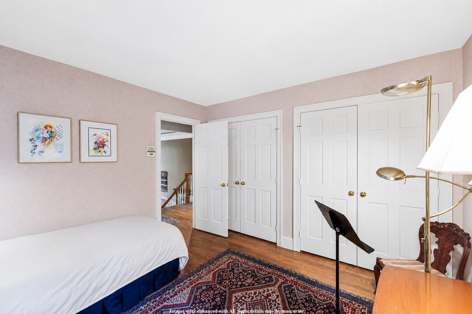 4753 Reservoir Road Northwest Washington, DC 20007 - Photo 25 of 51 a bedroom with a bed and wooden floor