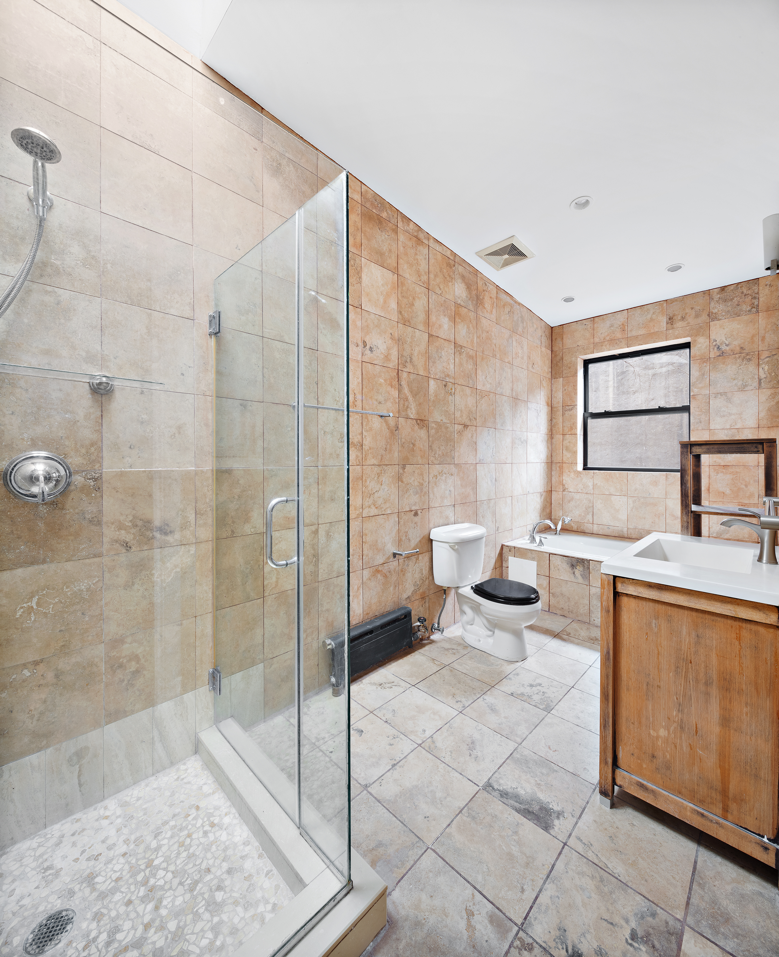 2 South Oxford Street, Unit 1 Brooklyn, NY 11217 - Photo 7 of 8 a bathroom with a sink toilet and shower