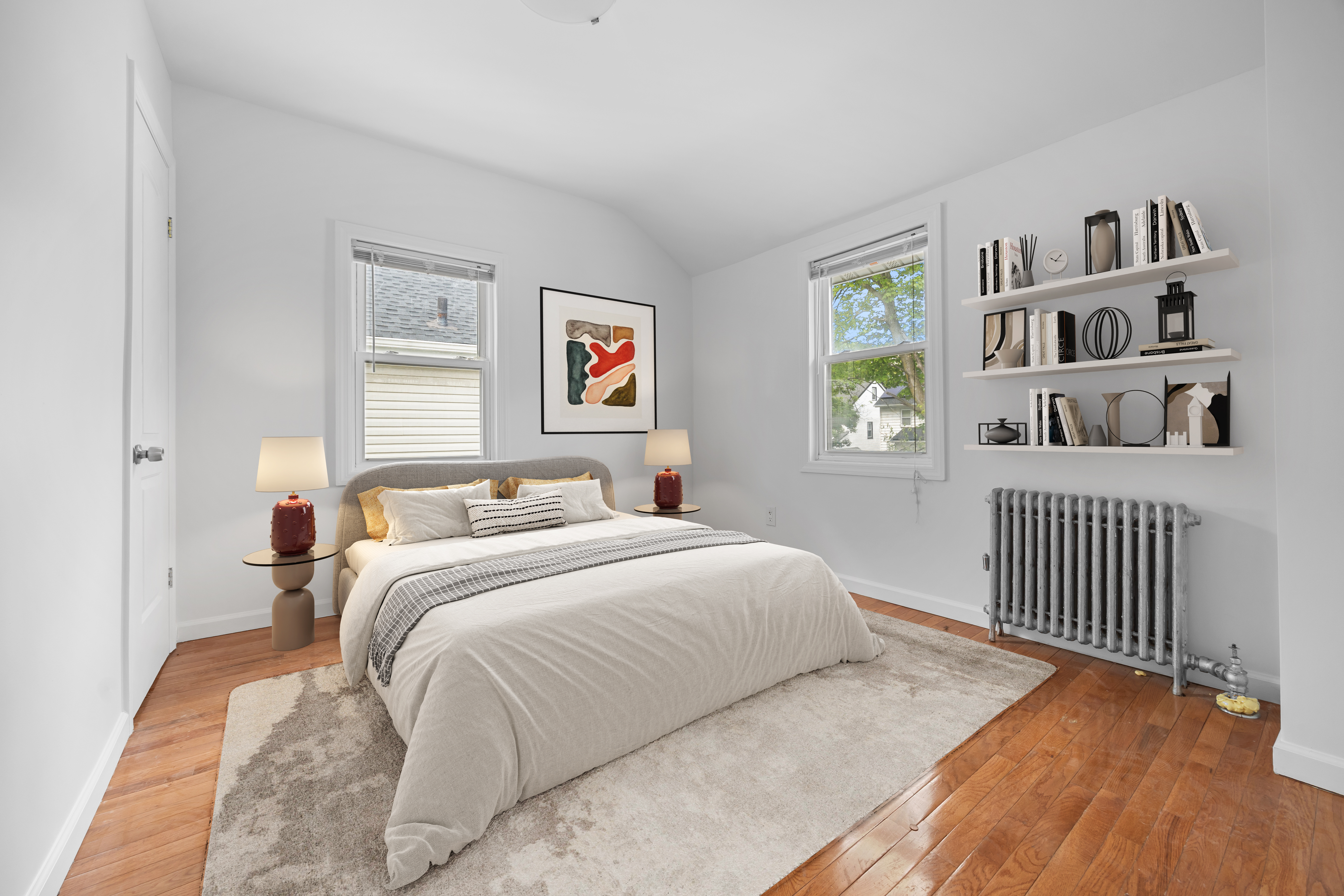194-35 114th Drive Queens, NY 11412 - Photo 9 of 21 a bedroom with a bed and a book shelf