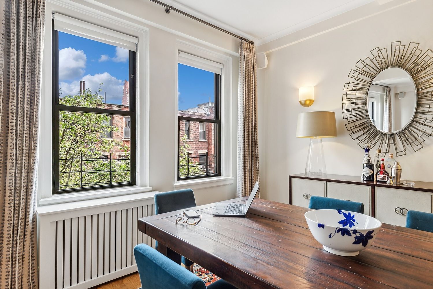 a view of dining room and wooden floor