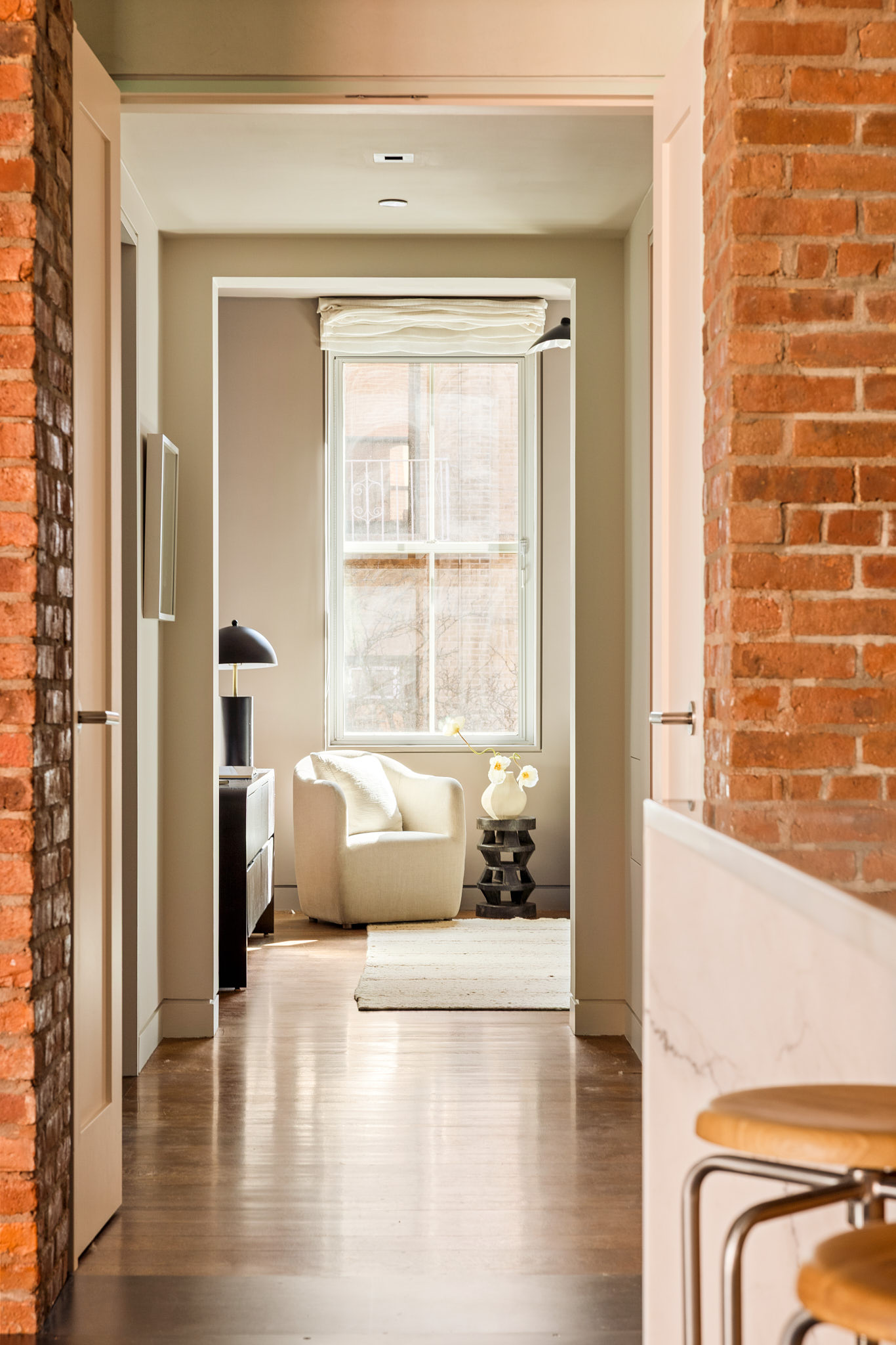 34 Prince Street, Unit 3B Manhattan, NY 10012 - Photo 5 of 18 a view of living room with a couch and wooden floor