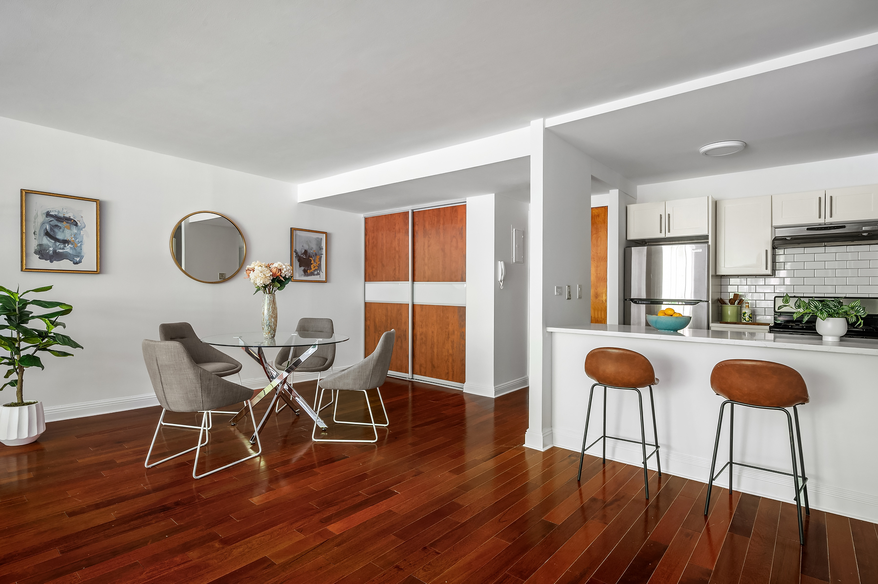 386 Columbus Avenue, Unit 2A Manhattan, NY 10024 - Photo 3 of 9 a view of a dining room with furniture and wooden floor