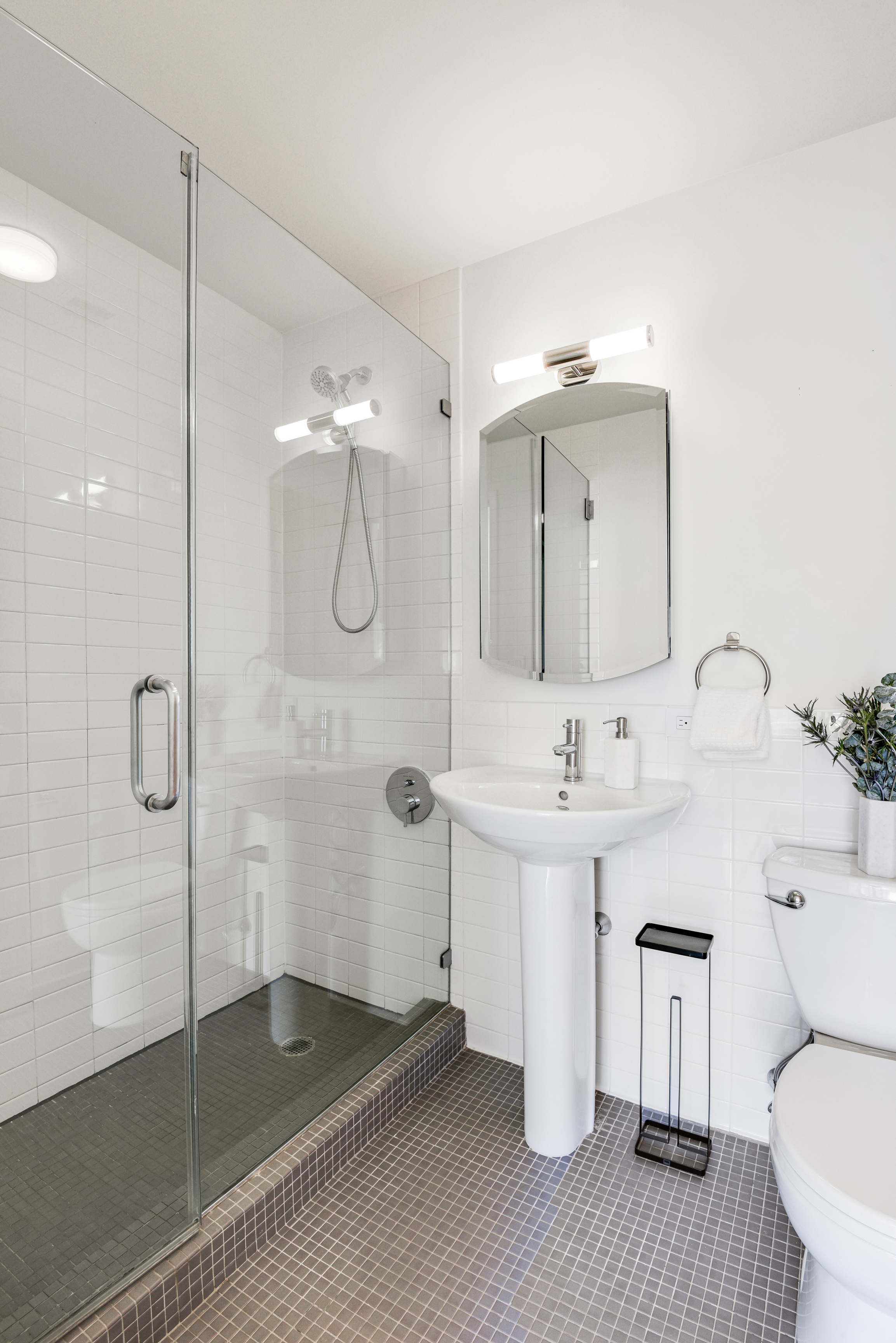475 Sterling Place, Unit 3A Brooklyn, NY 11238 - Photo 13 of 23 a bathroom with a sink a toilet and shower
