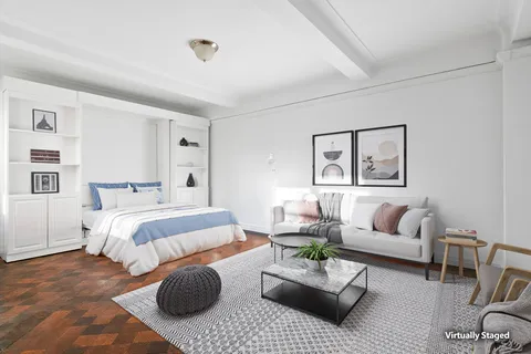 a bedroom with furniture and a couch