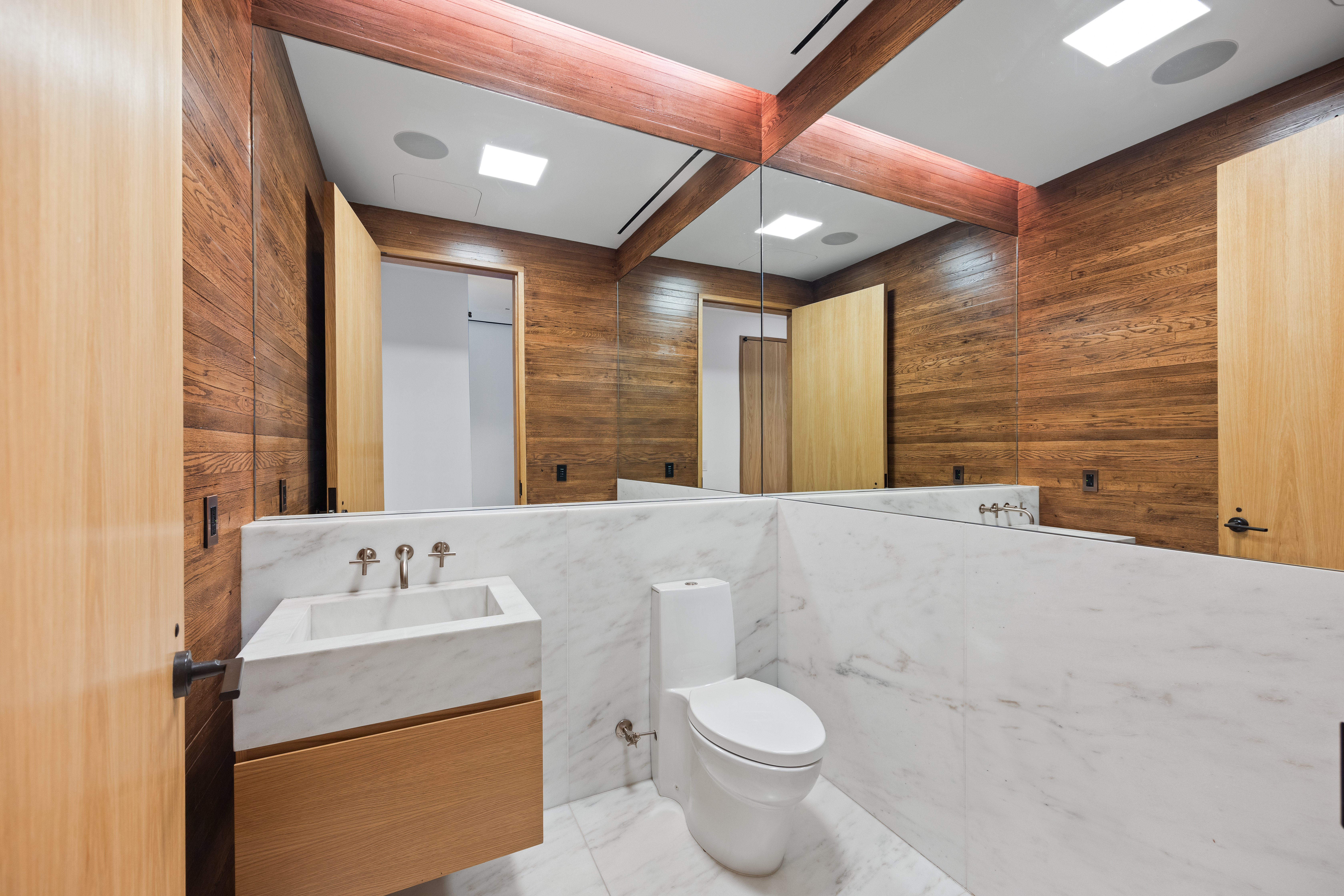 60 White Street, Unit 4E Manhattan, NY 10013 - Photo 17 of 19 a bathroom with a sink mirror toilet and bathtub