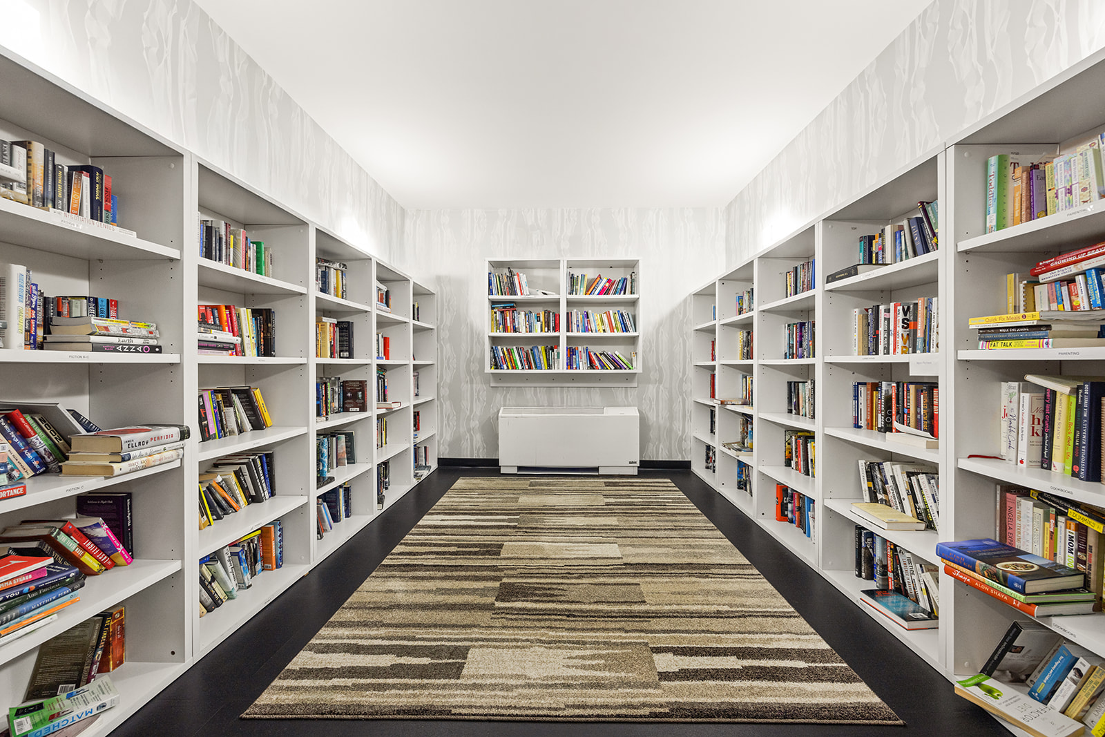 360 Furman Street, Unit 322/323 Brooklyn, NY 11201 - Photo 27 of 42 a view of room with windows book shelves