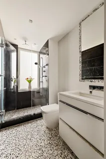 a living room with a couch and a flat screen tv