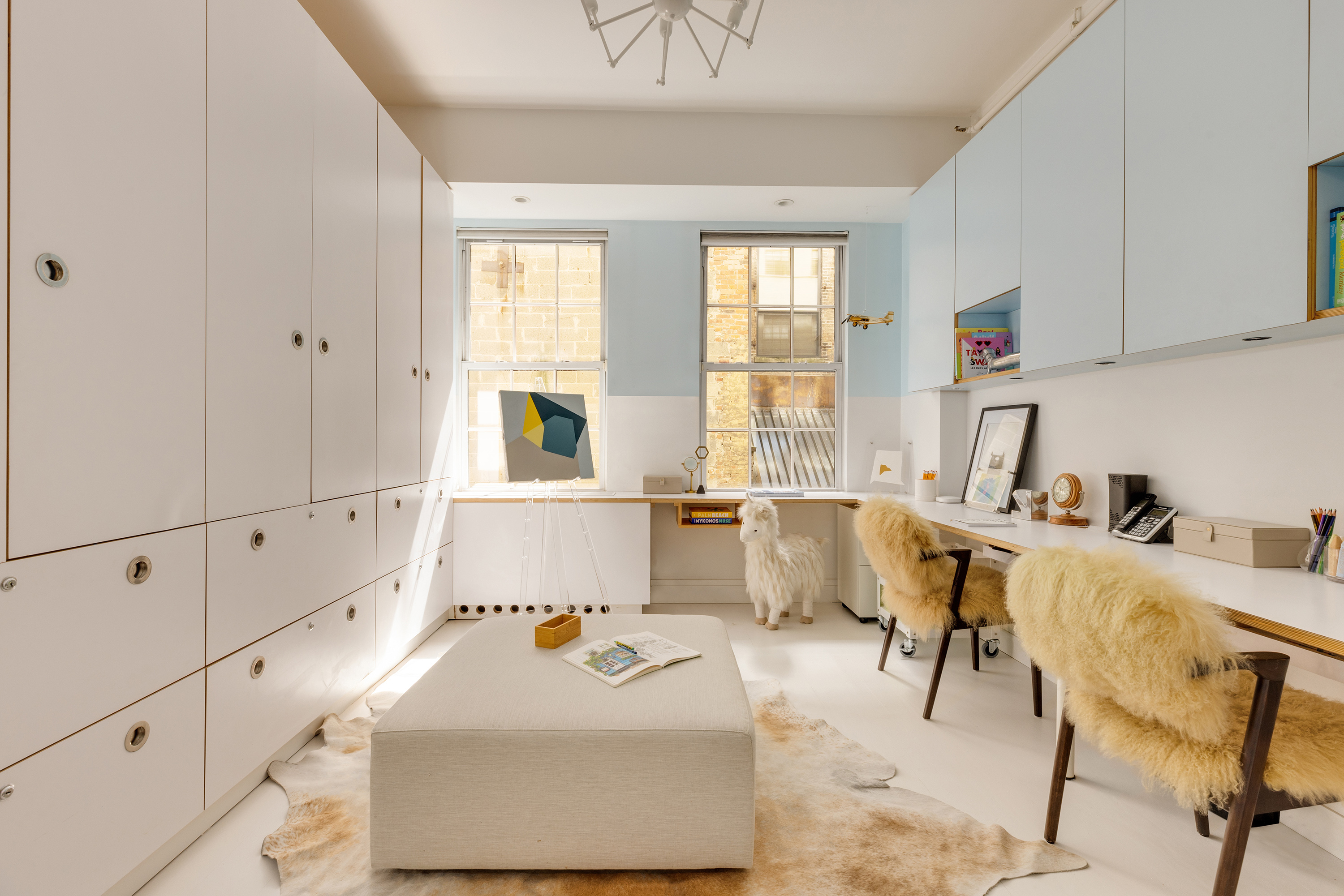 18 Leonard Street, Unit 2D Manhattan, NY 10013 - Photo 19 of 22 a living room with furniture and window